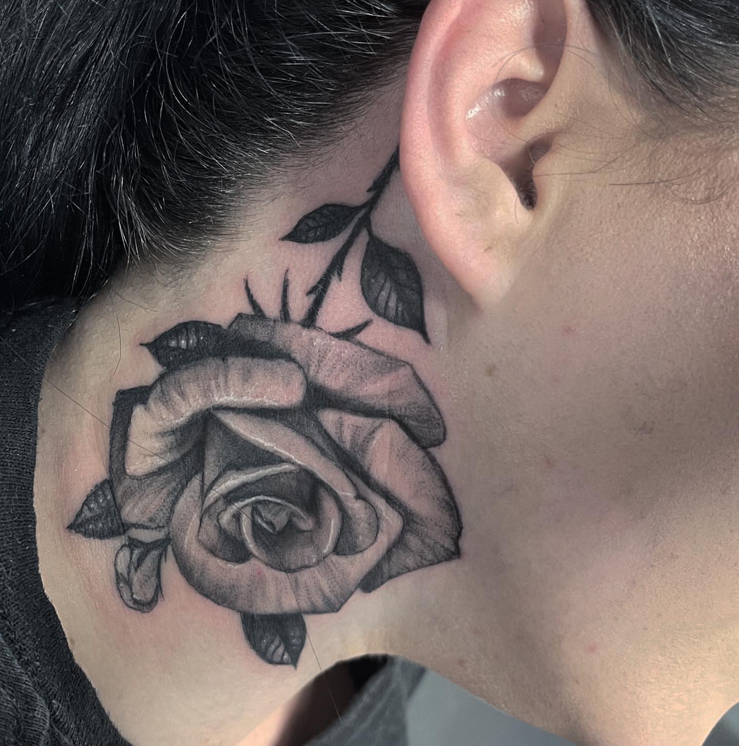 Rose black and grey tattoo on the neck by Greg West Sac tattoo artist, West Sacramento, California