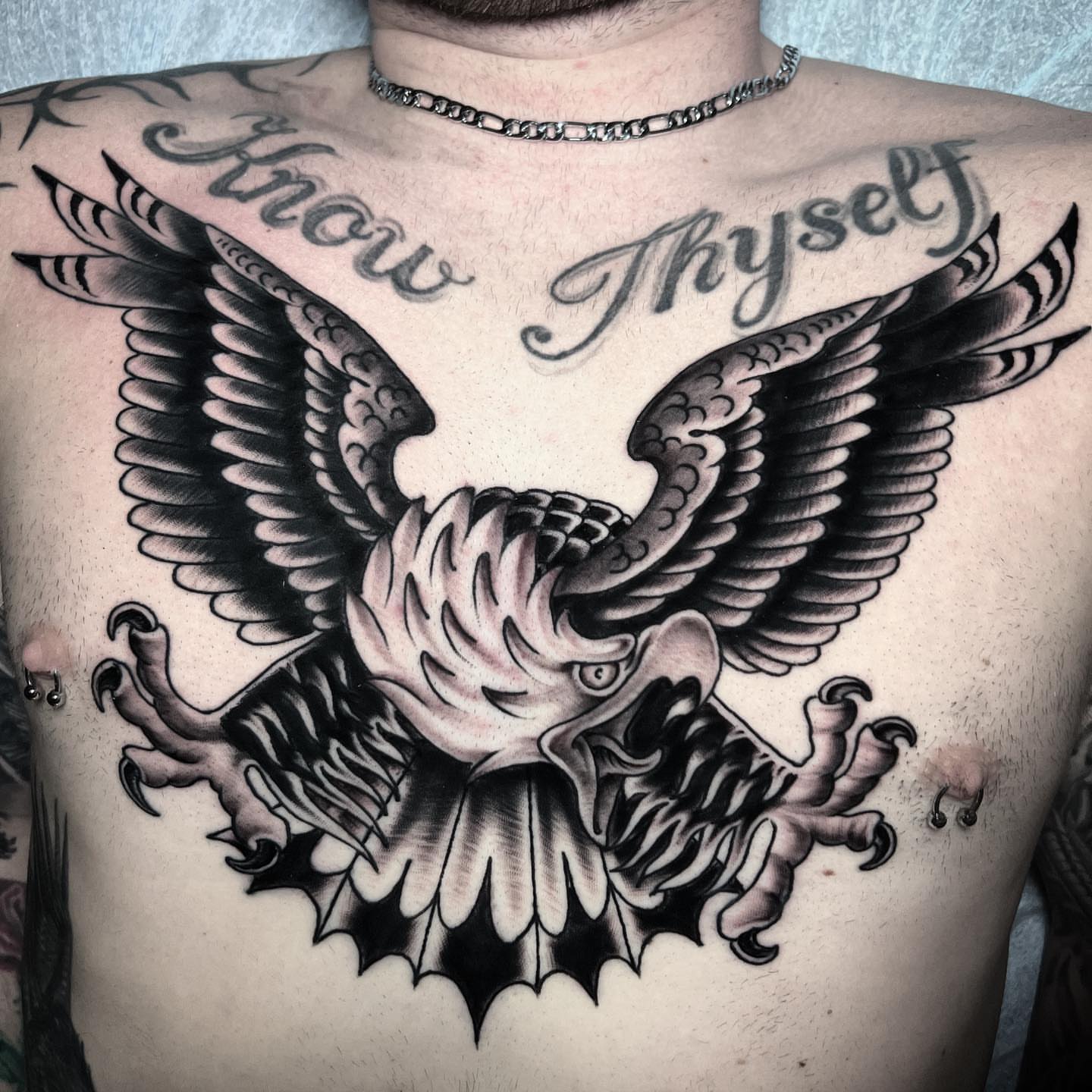 Eagle American traditional tattoo on the chest by Barron