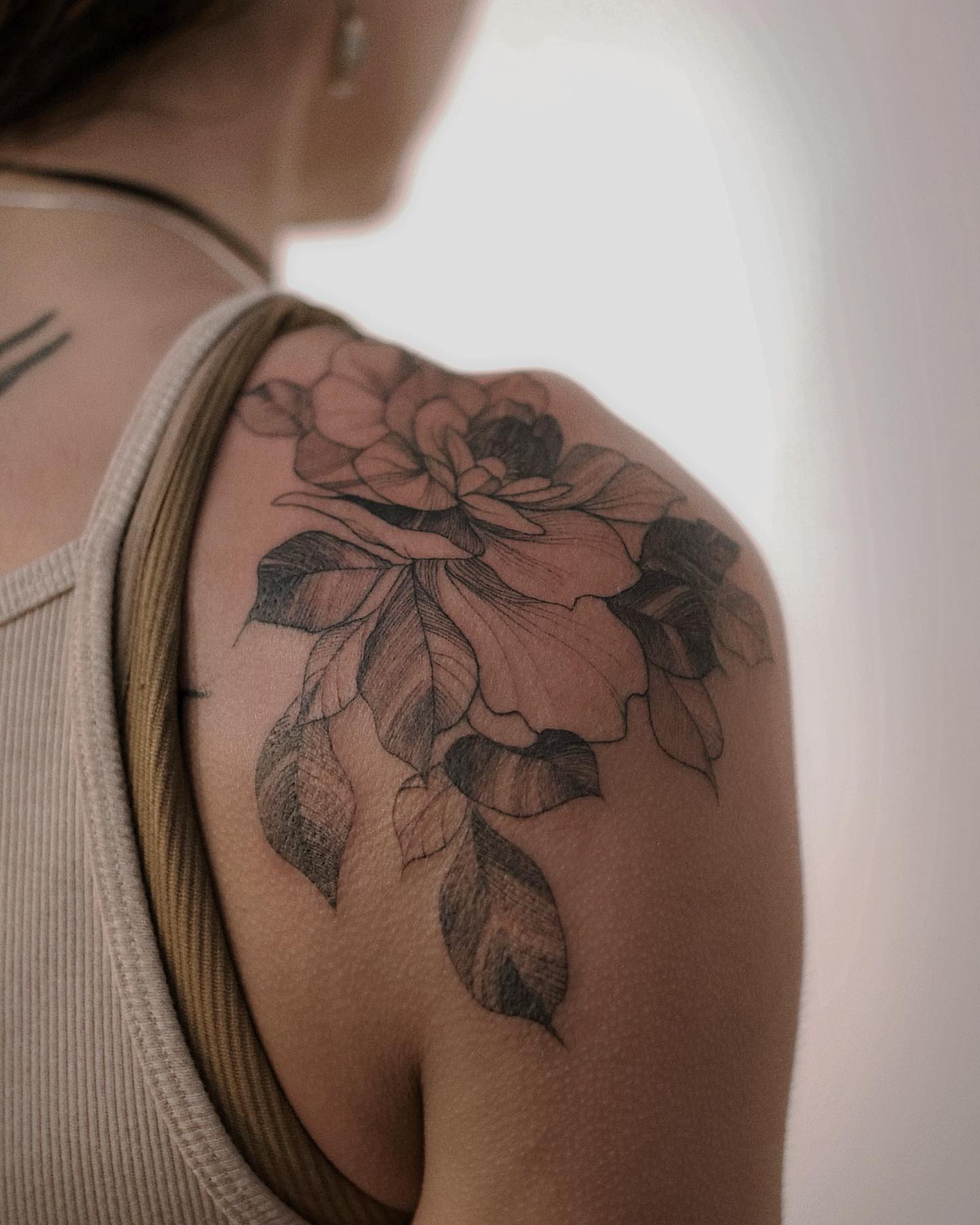 Flower realism tattoo on the shoulder by Liv