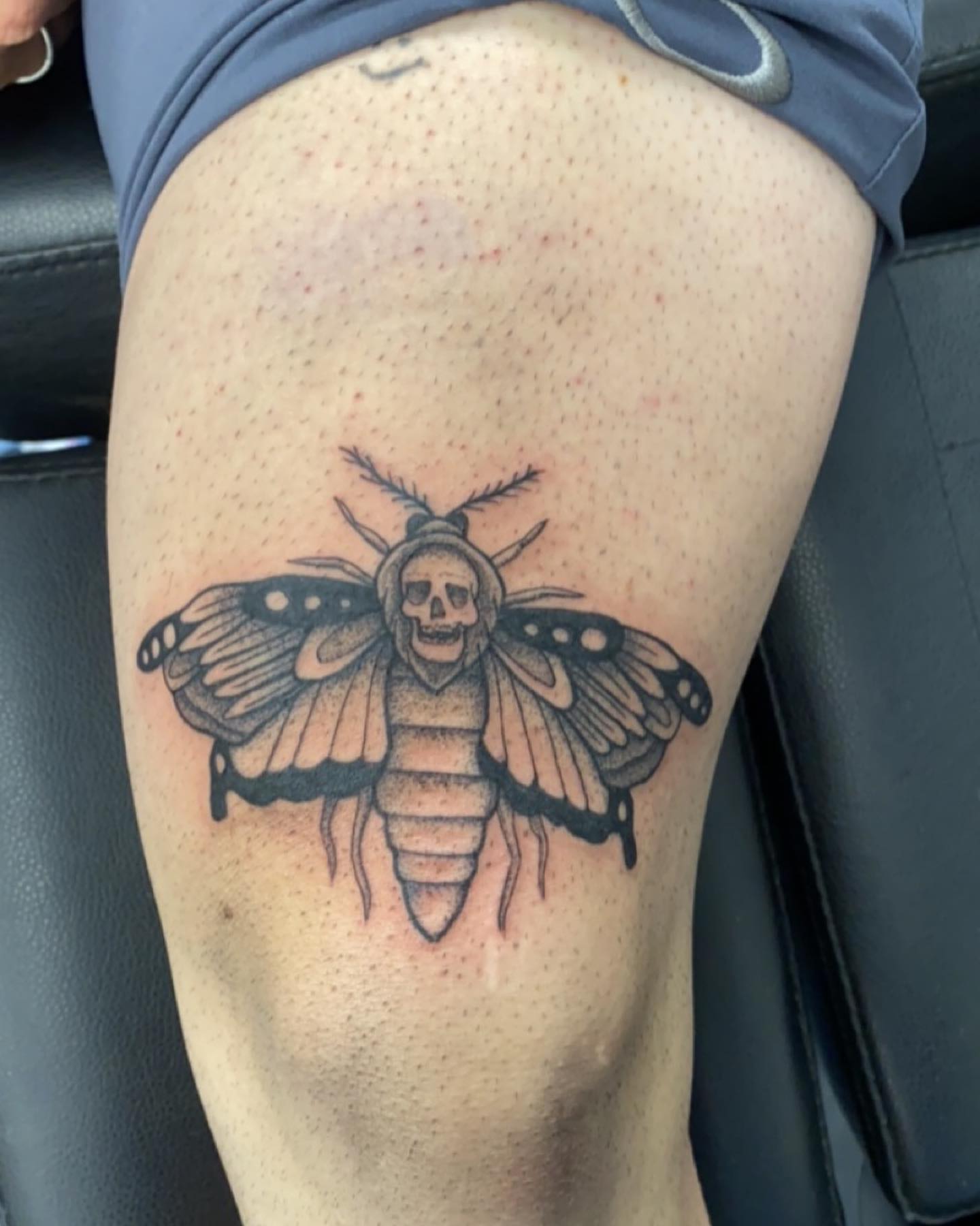 Death moth black and grey tattoo on the thigh by Kenzie🖤