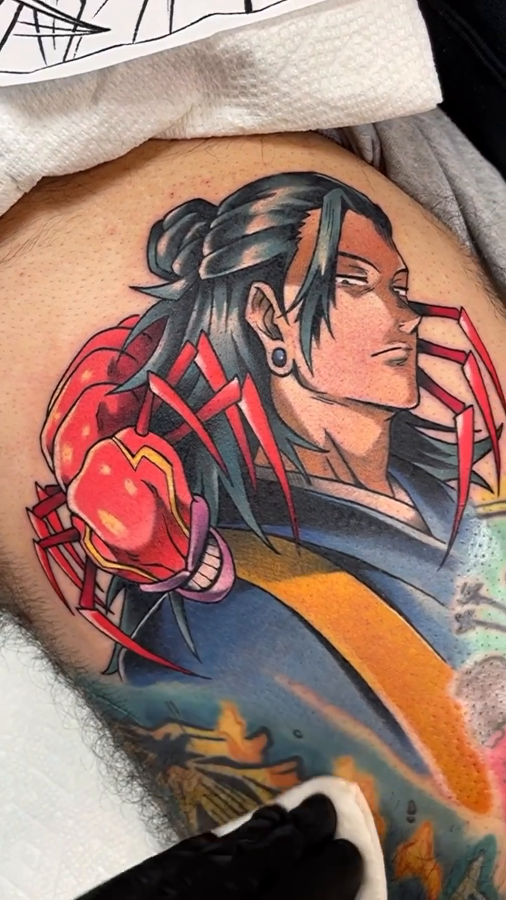 Man with headphones anime tattoo by Bold Anime Tattoos
