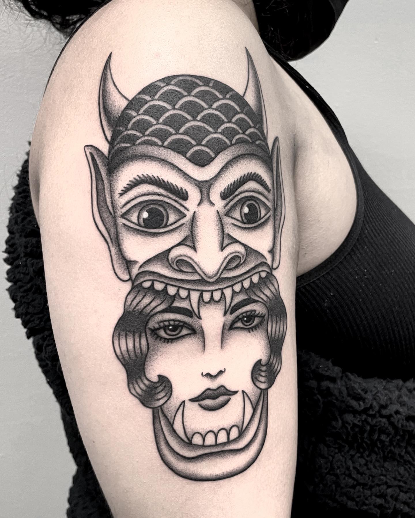 Demon and woman realism tattoo on the upper arm by Jenn ★ Reid