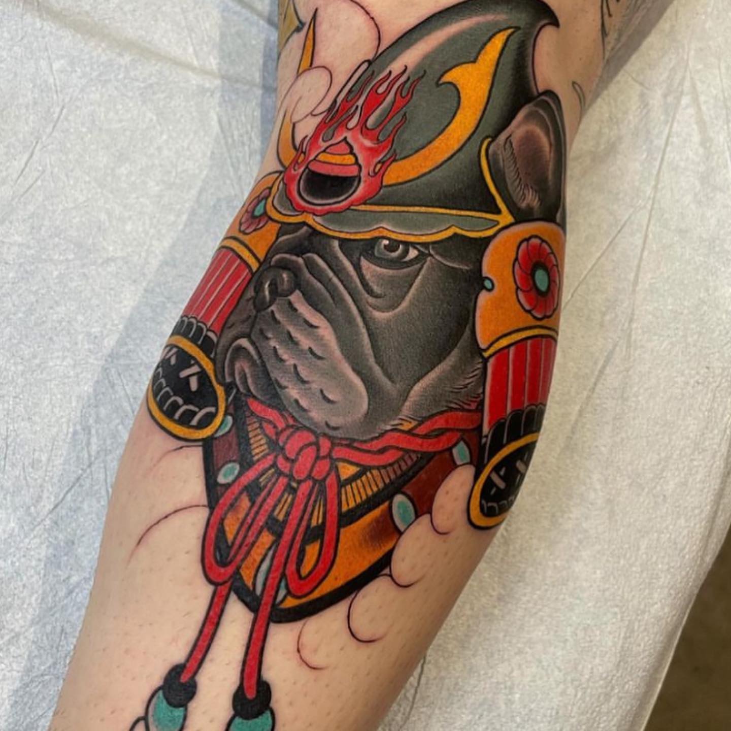 Dog mask American traditional tattoo on the forearm by Tony Medellin 7X9X