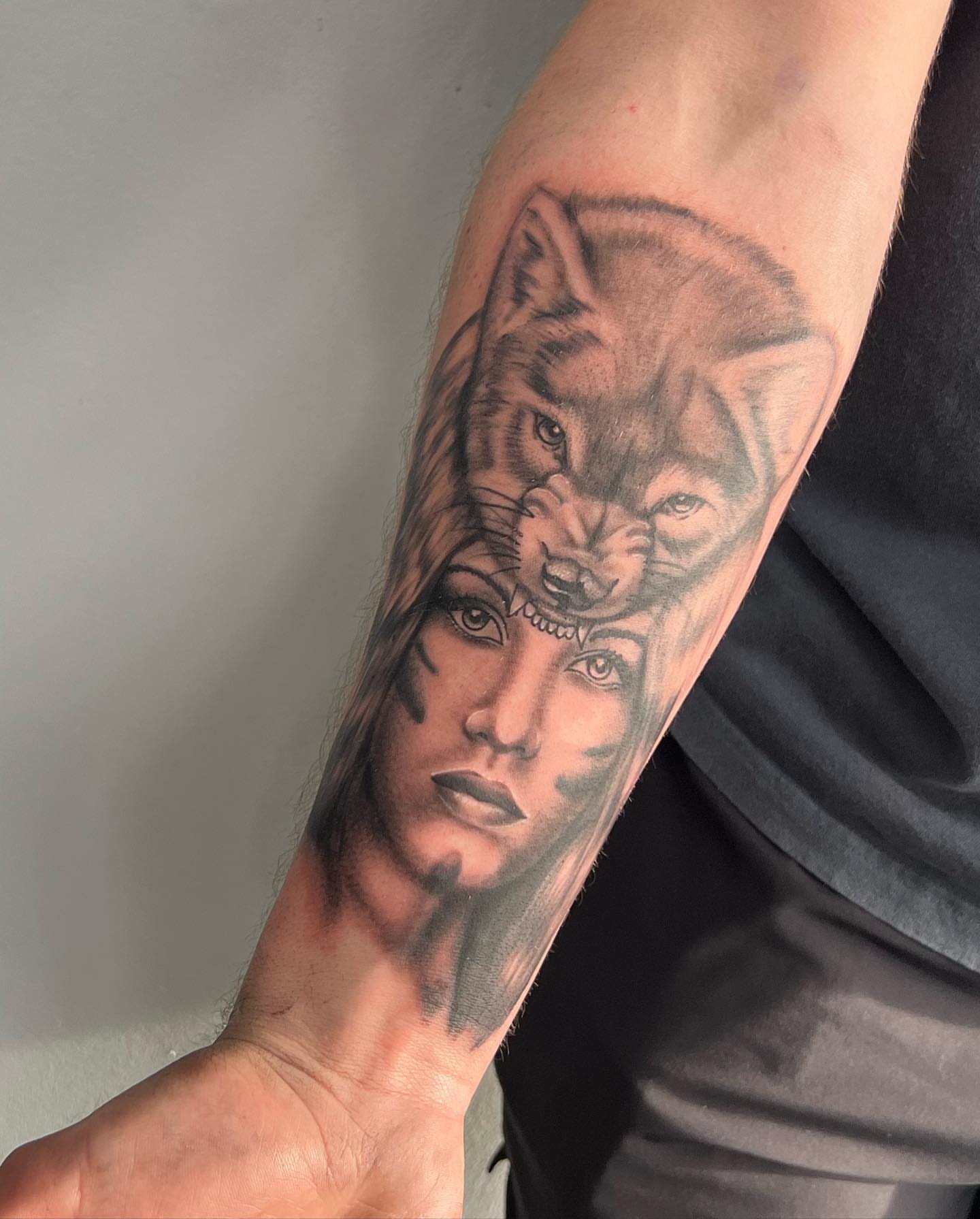 Woman with wolf realism tattoo on the forearm by 🔥Austin Burke 🔥TATTOO ARTIST