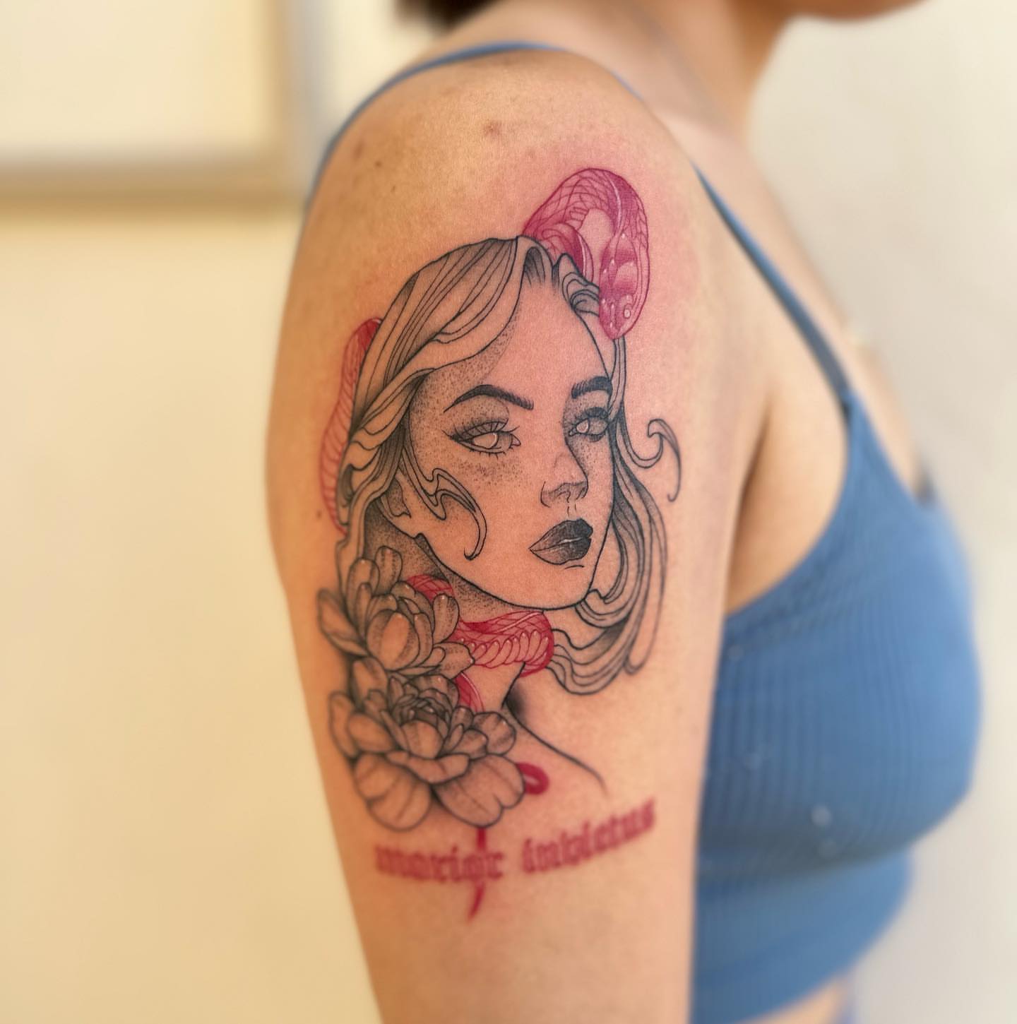 Woman with flowers realism tattoo on the shoulder by alex h🪴 neotrad