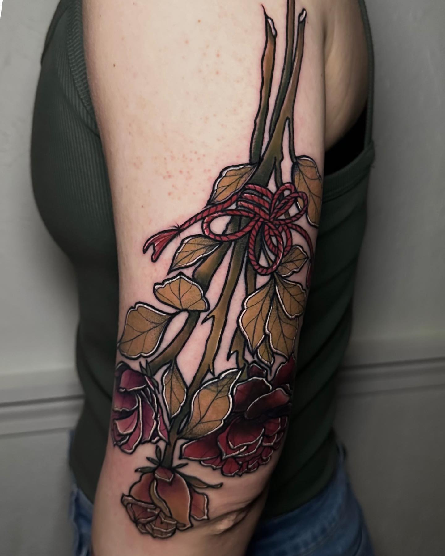 Roses and leaves new school tattoo on the forearm by Naysla Droguett