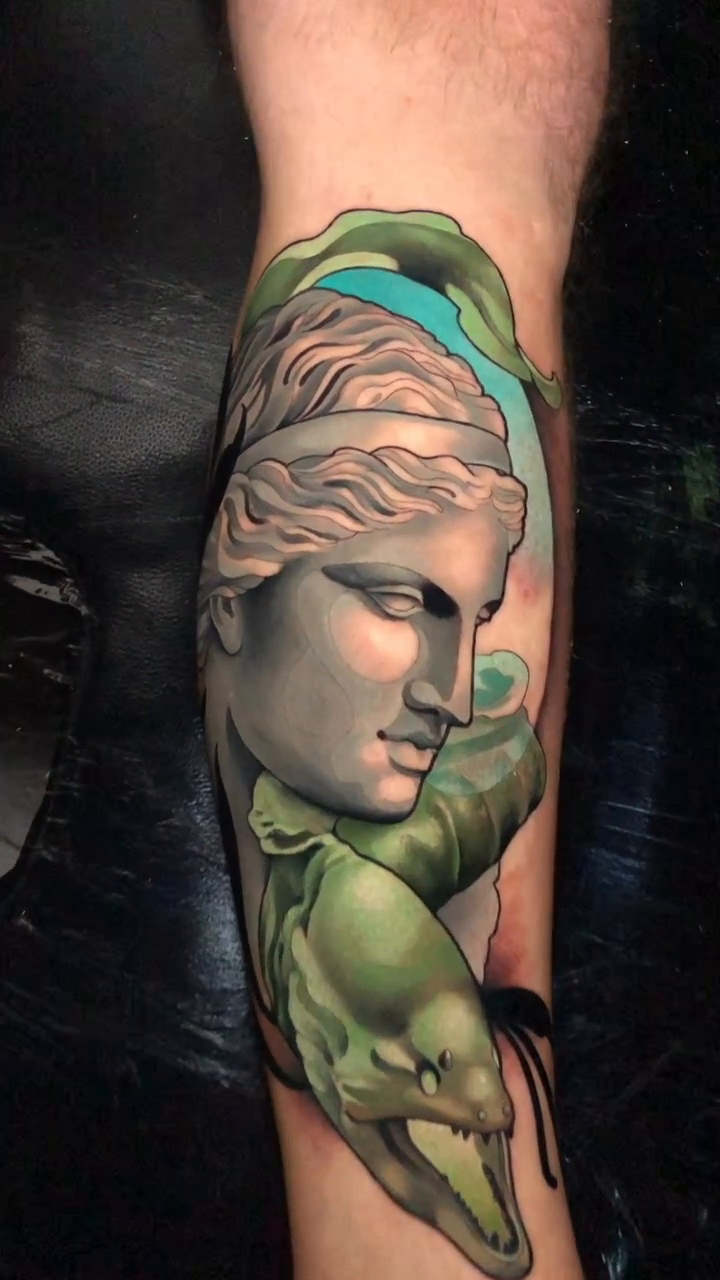 Woman bust and snake realism tattoo by Evin Pfaff, Bedford, Pennsylvania