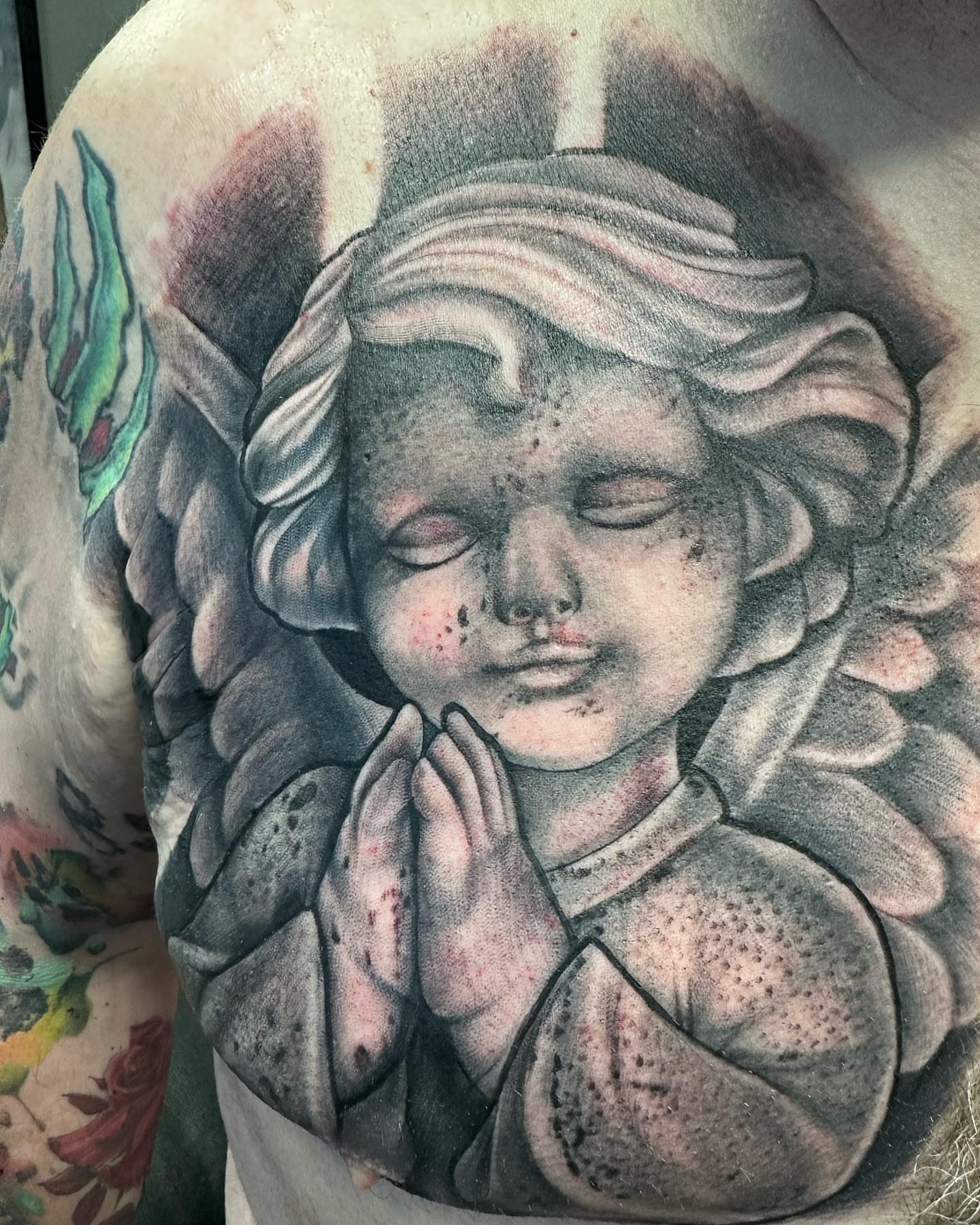 Praying angel realism tattoo on the shoulder by Pablo Venegas