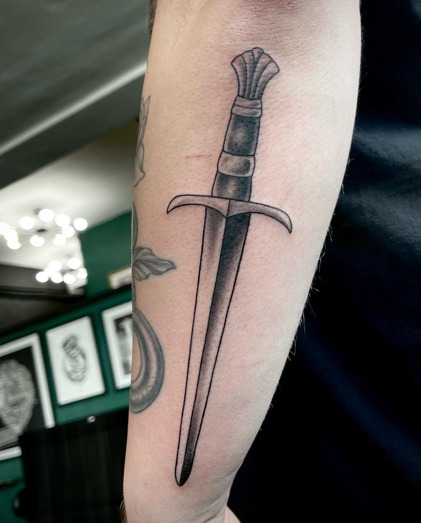 Sword black and grey tattoo on the forearm by Chelsea Youngblood, Seattle, Washington