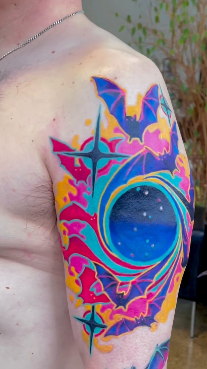 Cosmic vortex with bats new school tattoo by Sienna Coppa