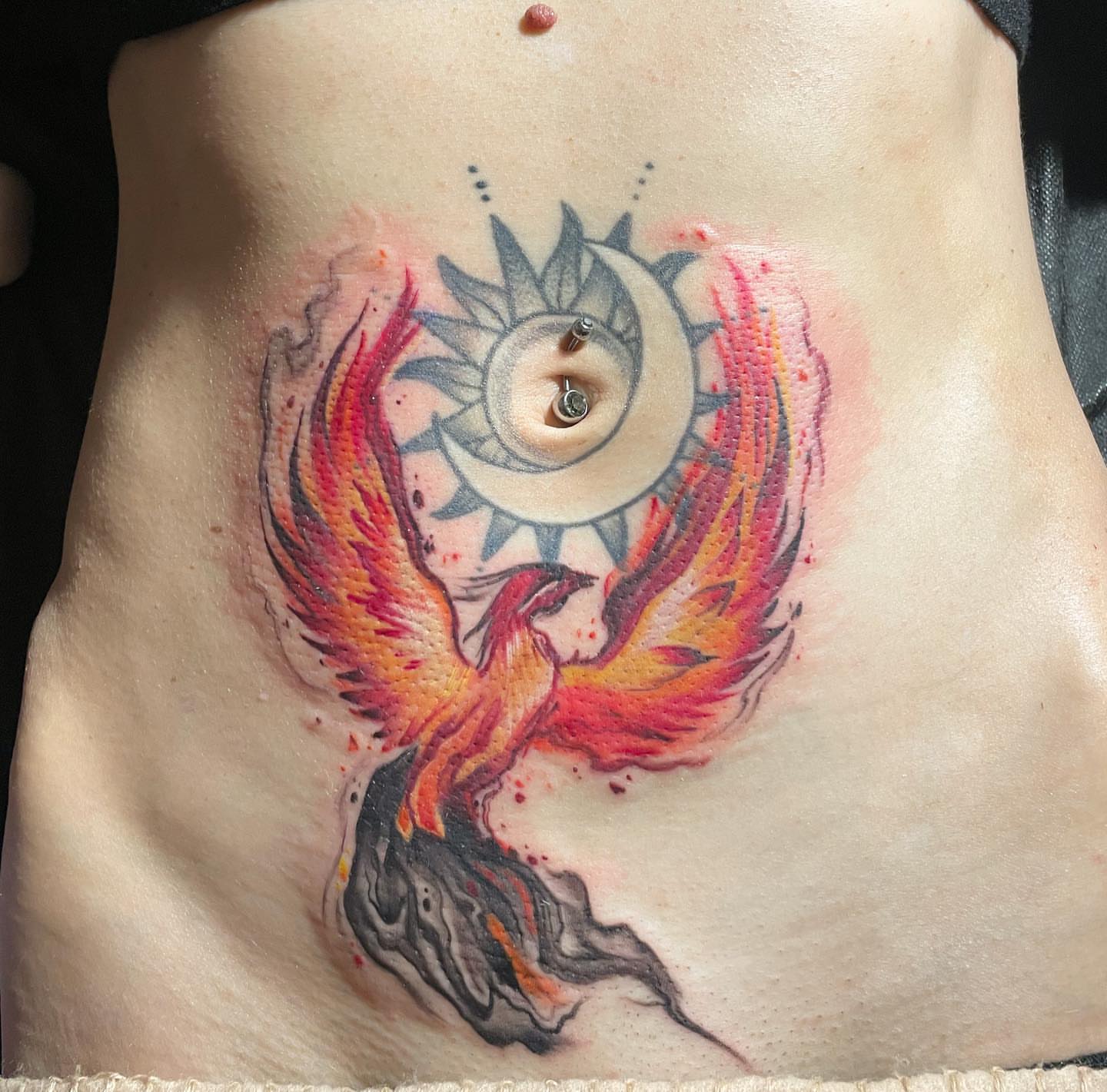 Phoenix new school tattoo on the torso by Ksu Storm, San Francisco, California