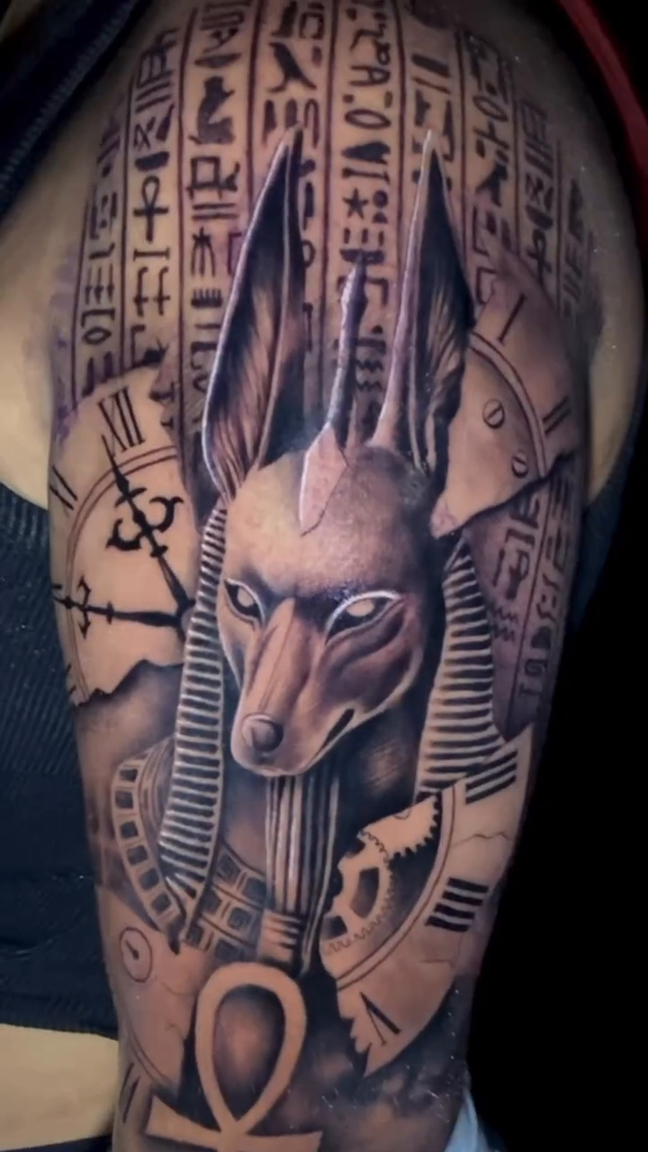 Anubis and Egyptian hieroglyphs realism tattoo by Clayderman