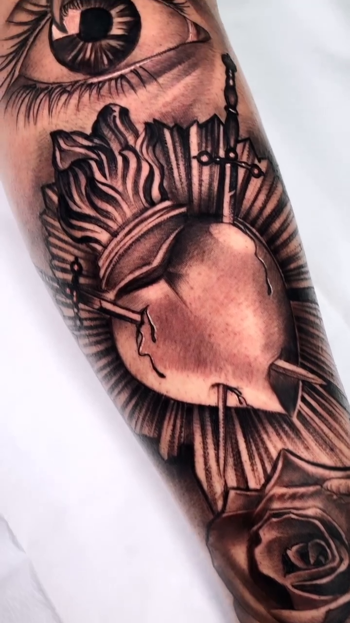 Sacred heart and eye realism tattoo by Ryan Jenkins, Las Vegas, Nevada