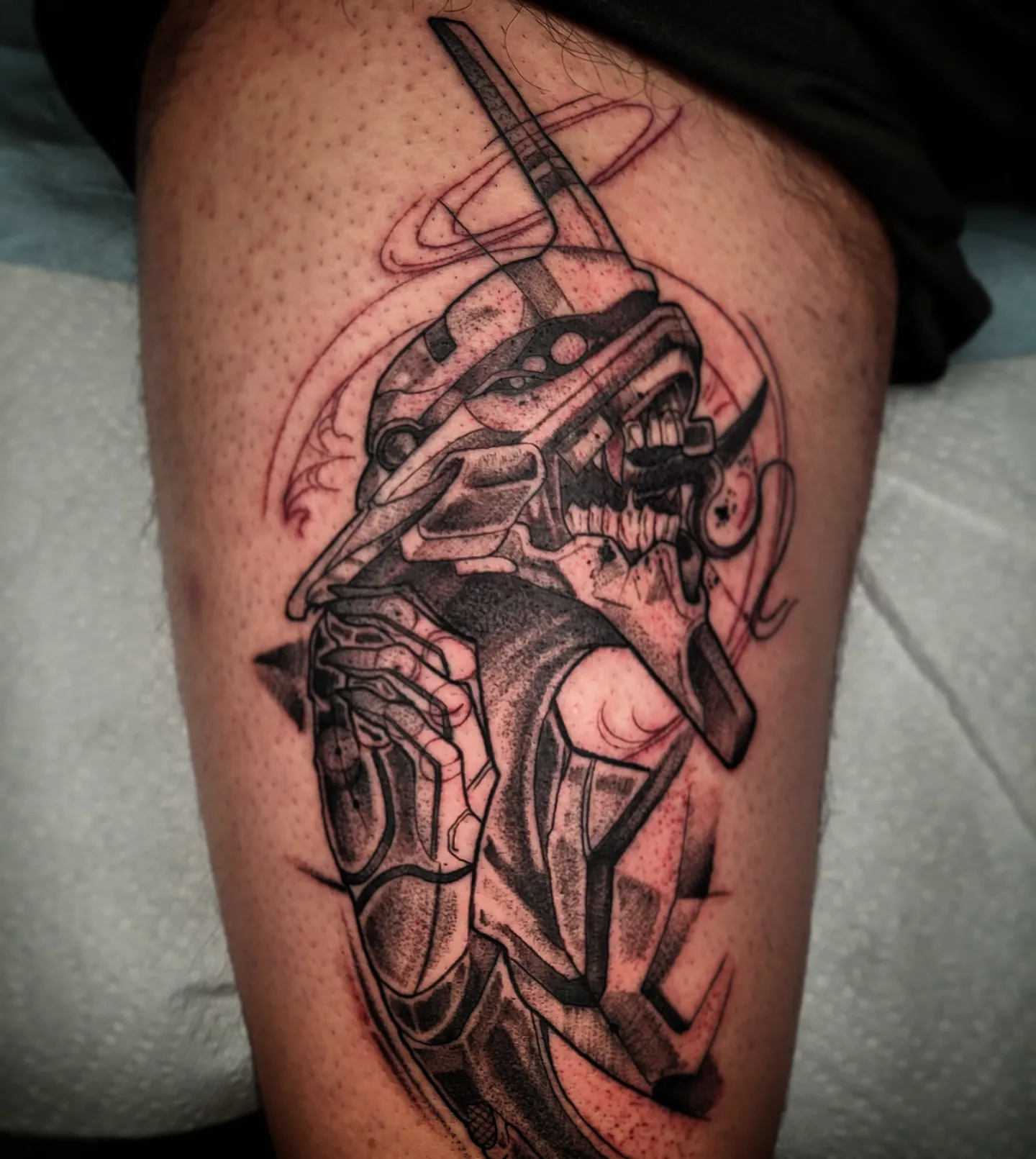 Mecha geometric tattoo on the thigh by TattoosbyPhatboi