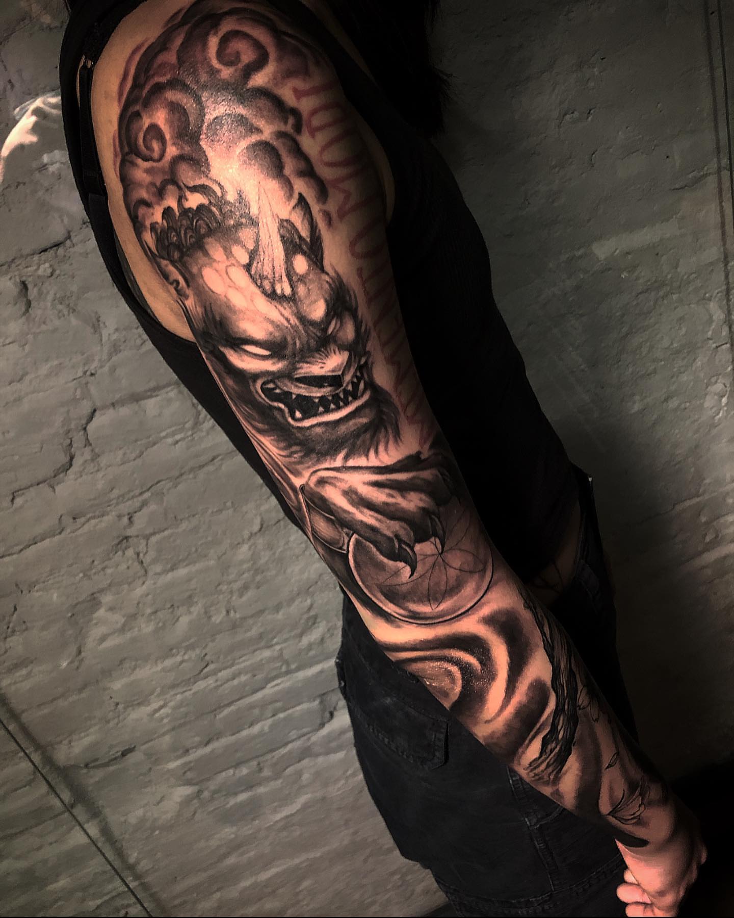 Demon face dark realism tattoo on the forearm by Xavi Xiva TATTOO