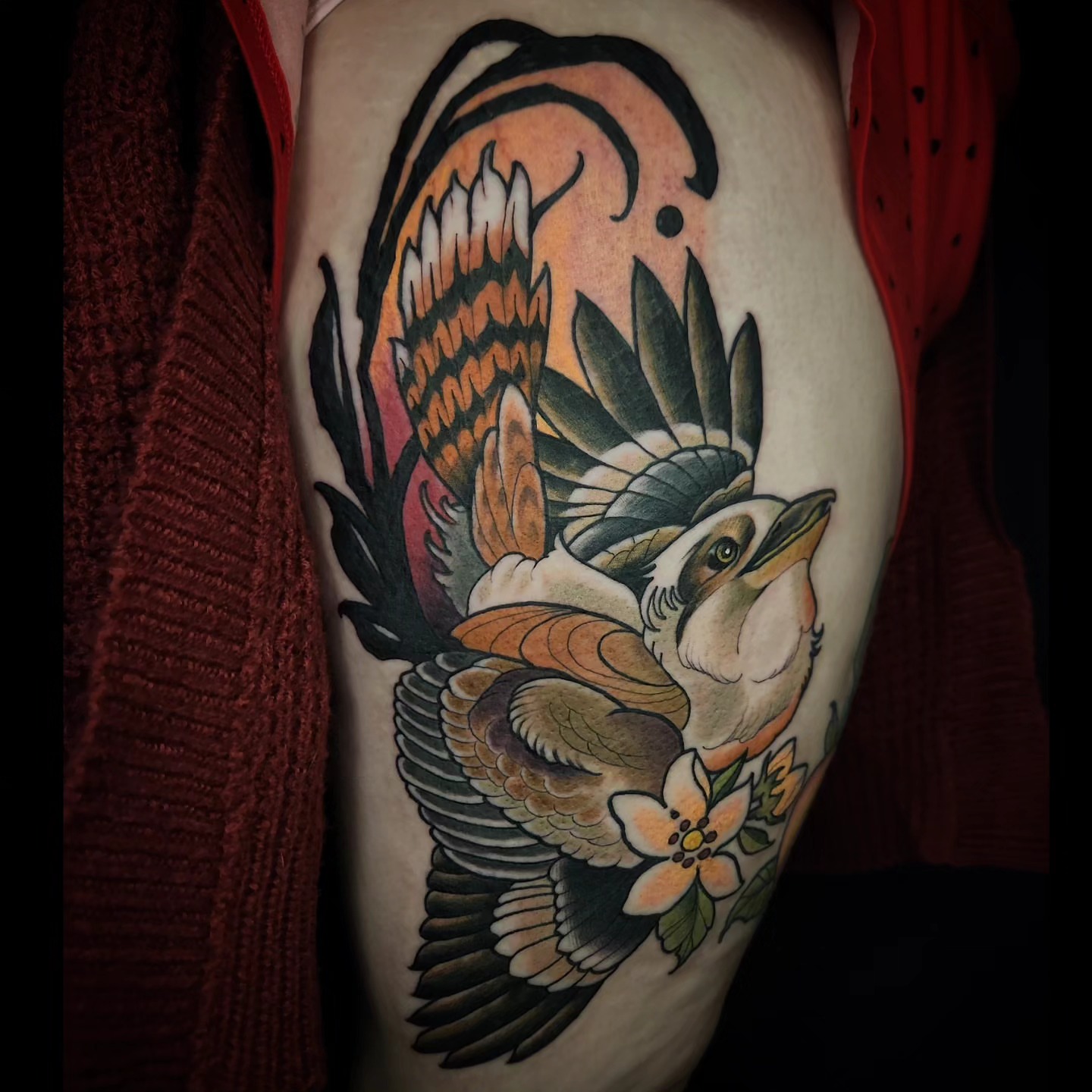 Bird with flowers American traditional tattoo on the thigh by Ben Friday, Phoenix, Arizona