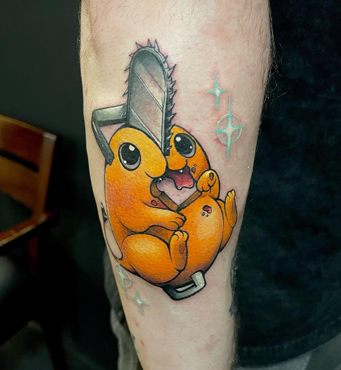 Pikachu with chainsaw new school tattoo on the forearm by Lexx Christine