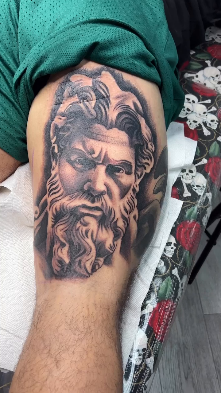 Bust of a man realism tattoo by Joseph Alvarado