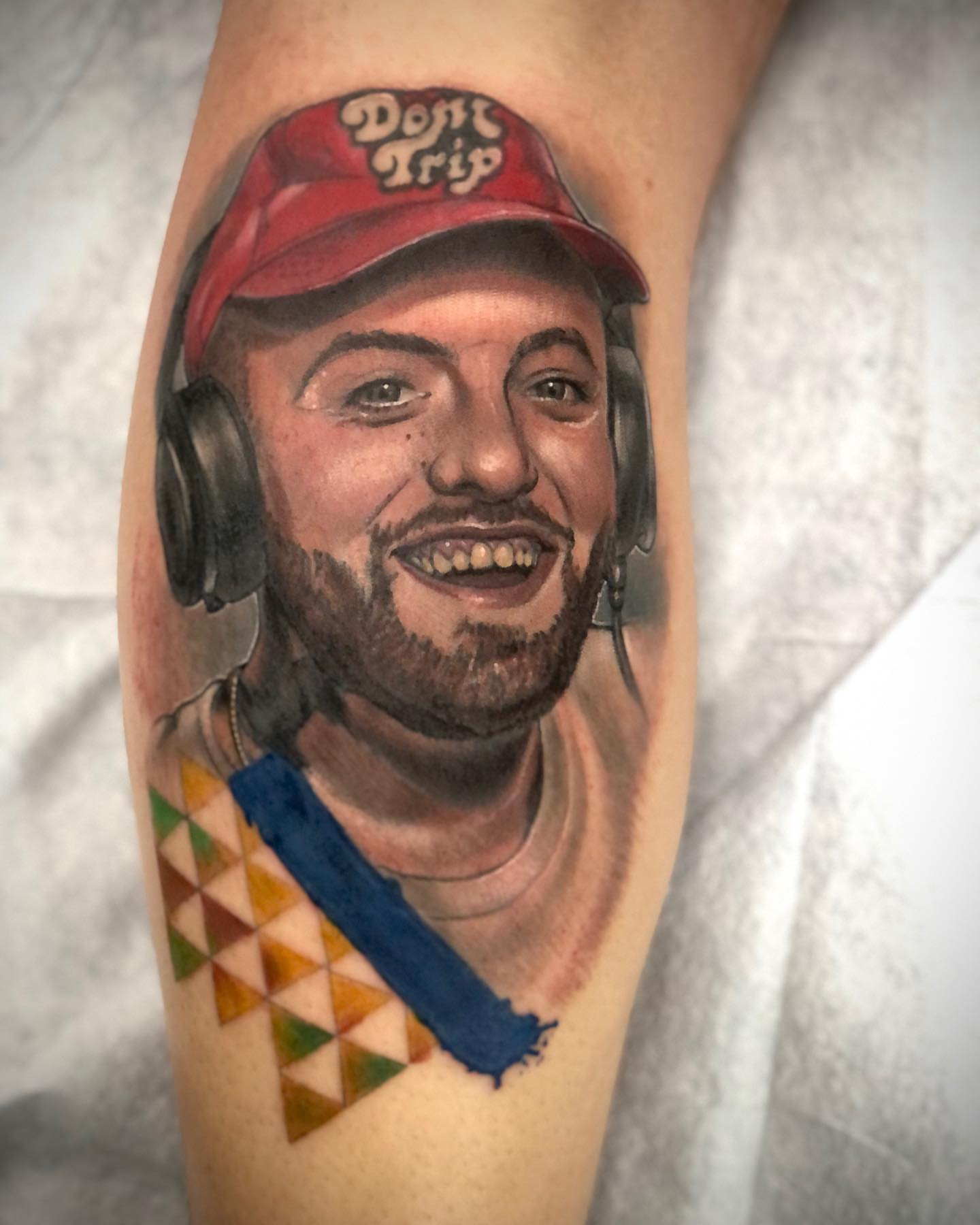 Portrait of a man realism tattoo on the forearm by Alec Bauer