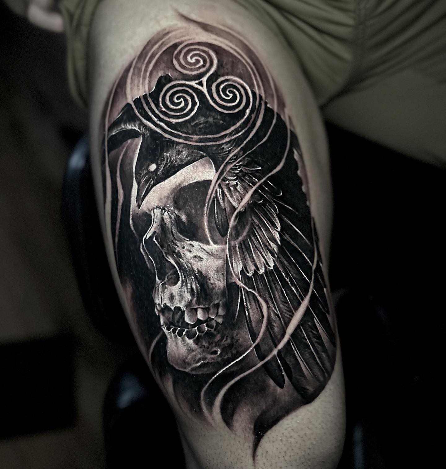 Skull with wings realism tattoo on the forearm by Gabe Jensen