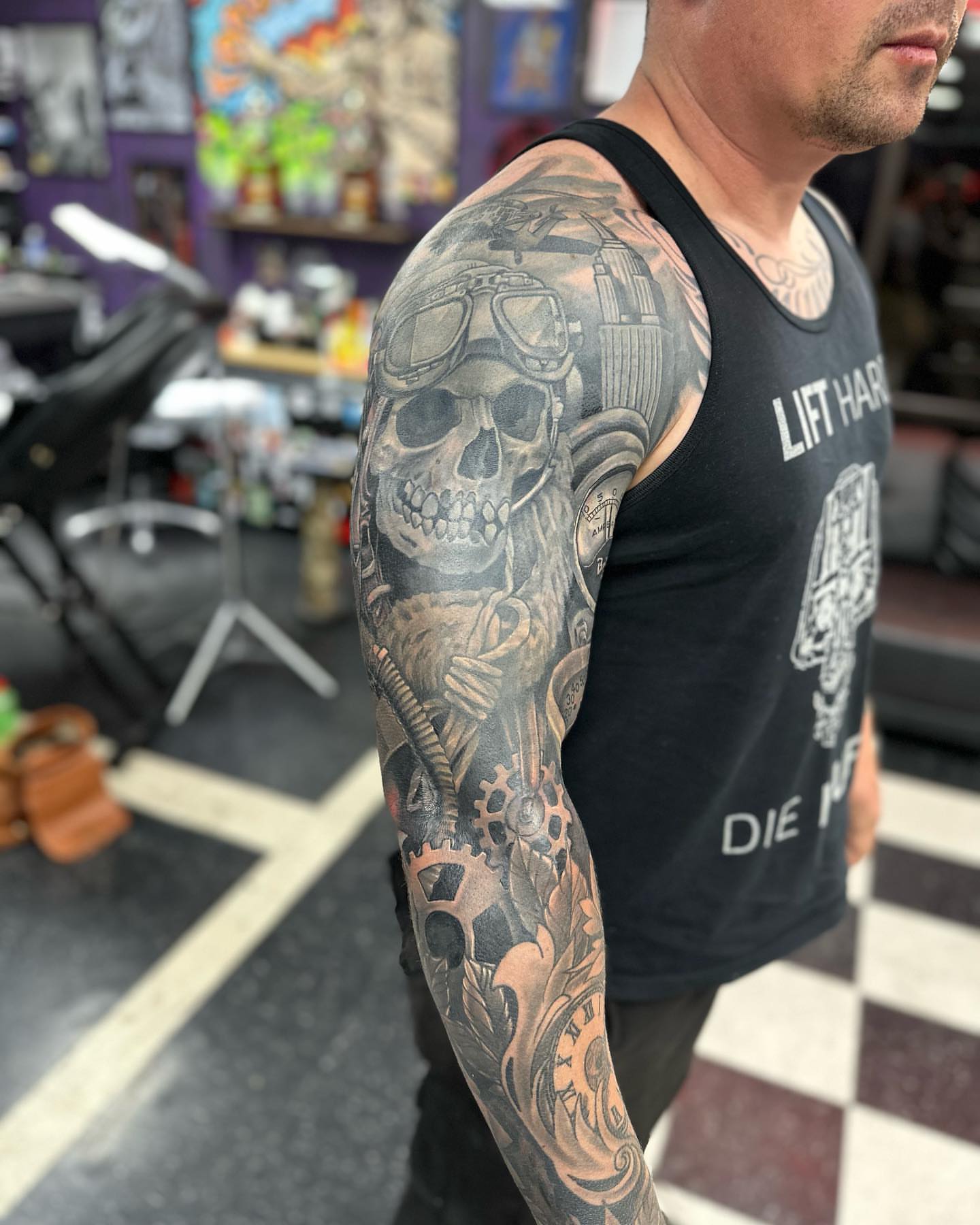 Tattoo by @inkplug__higherlevel — black_and_grey, realism