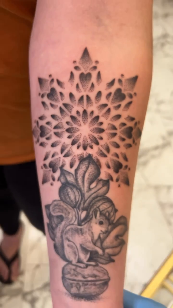 Squirrel and mandala geometric tattoo by Tattoos by Katherina, Willoughby, Ohio