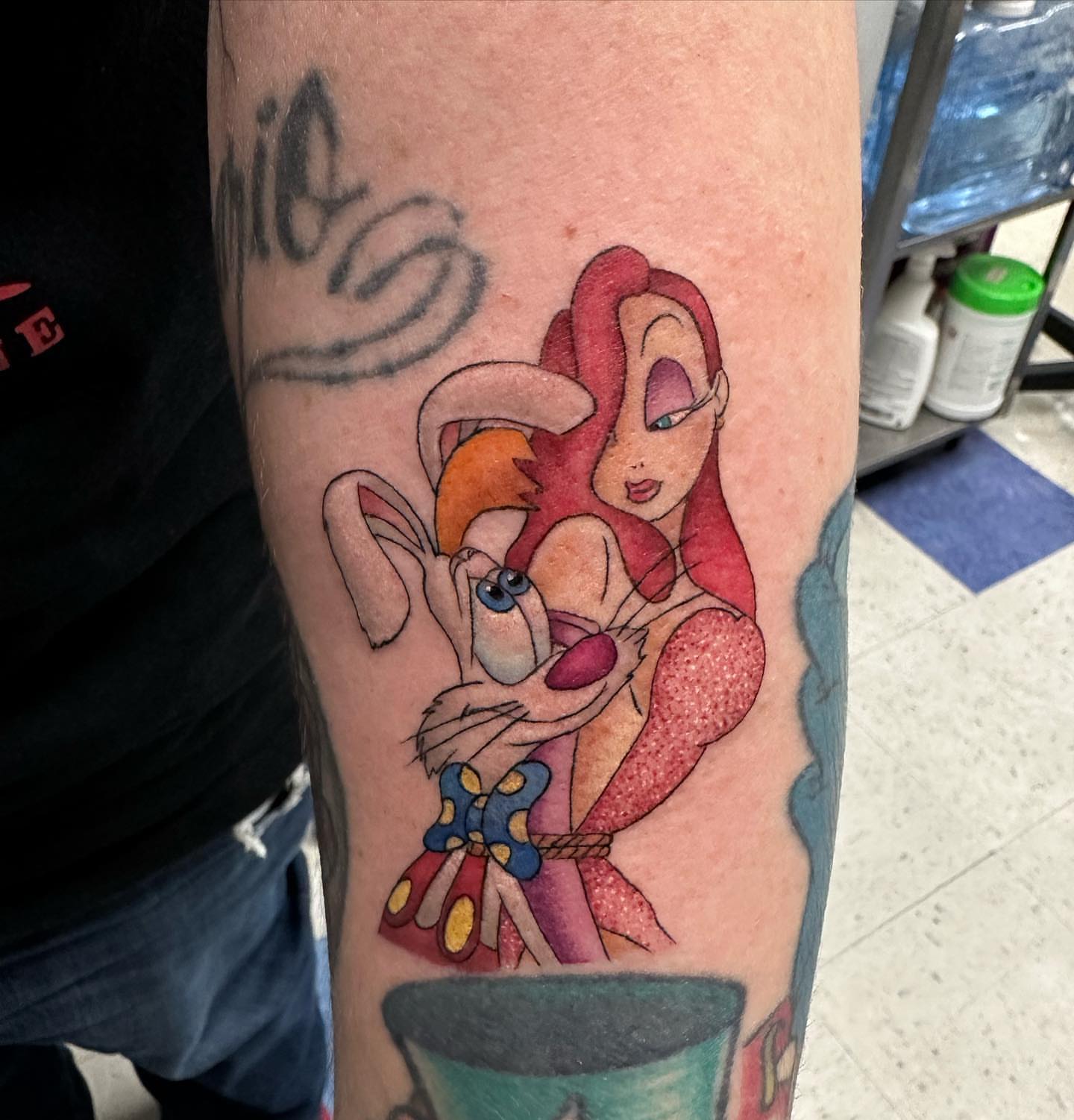 Looney tunes characters realism tattoo on the forearm by Summers