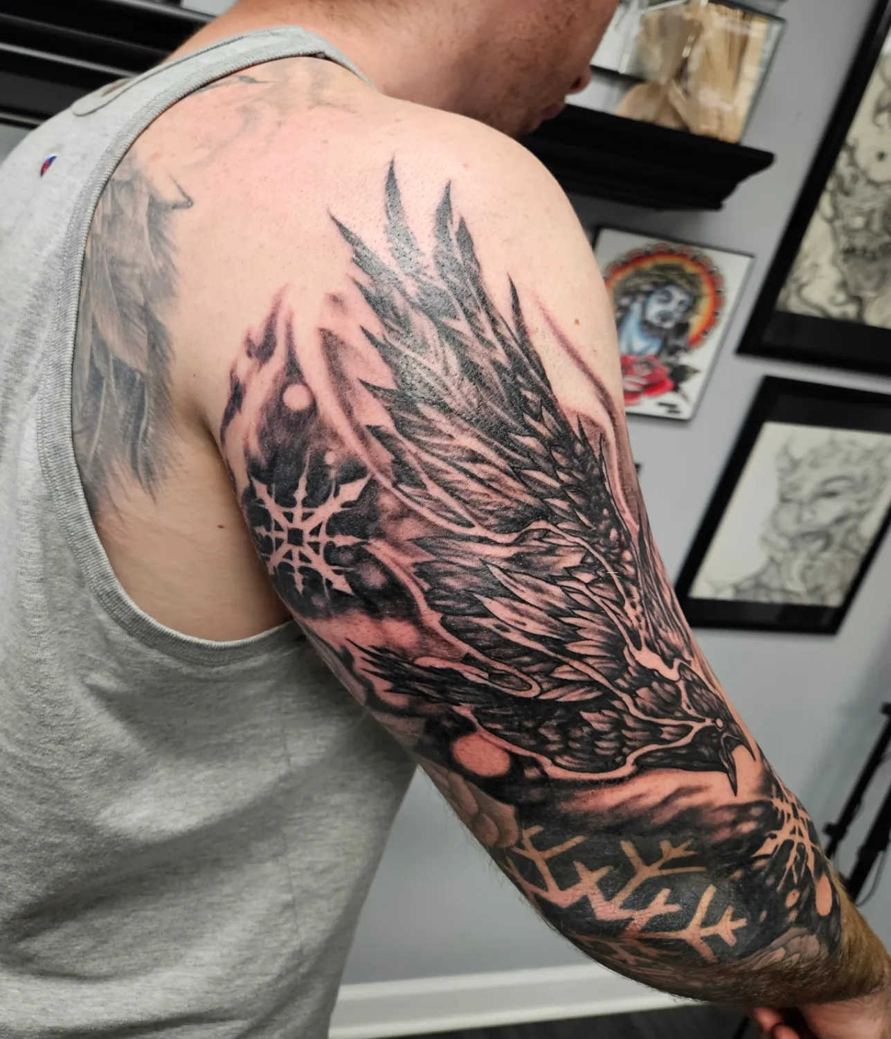 Wing black and grey tattoo on the upper arm by Chicagoland Tattoo artist - Dany Rojas