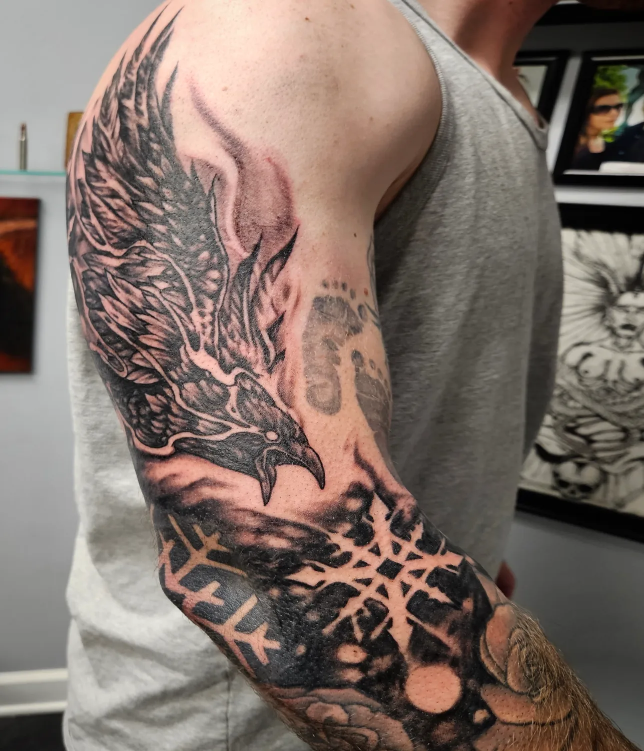 Phoenix geometric tattoo on the upper arm by Chicagoland Tattoo artist - Dany Rojas
