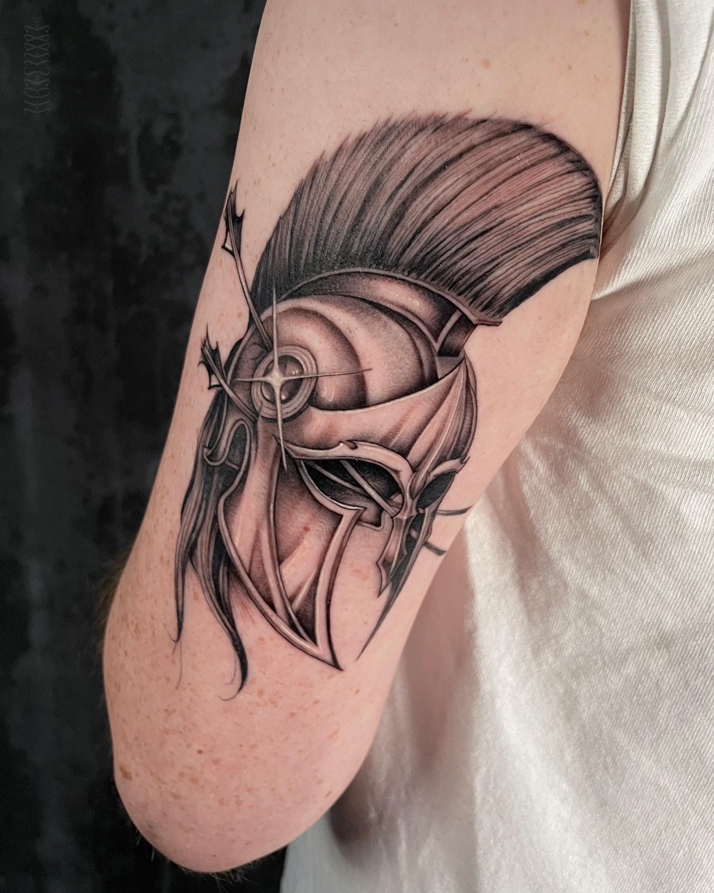 Helmeted warrior geometric tattoo on the forearm by Steve Franciosa