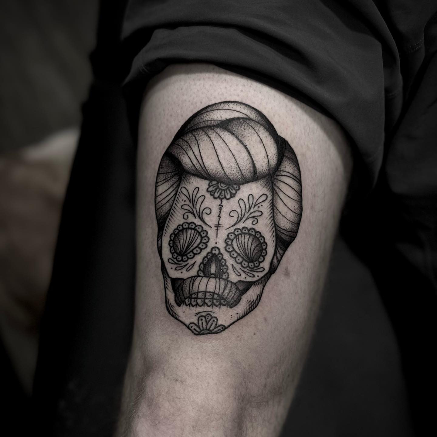 Sugar skull black and grey tattoo on the thigh by t a y l o r