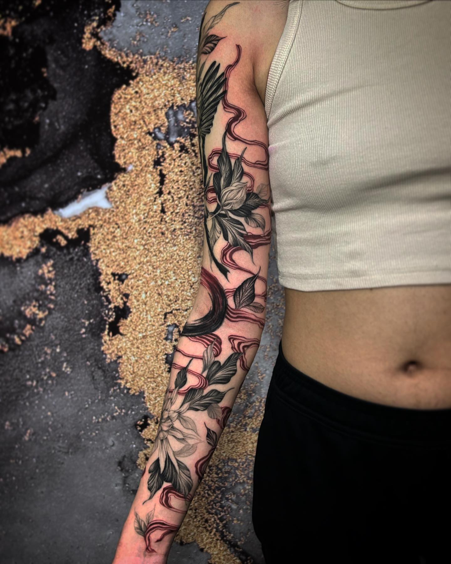 Lotus flower American traditional tattoo on the forearm by Cindy Xu