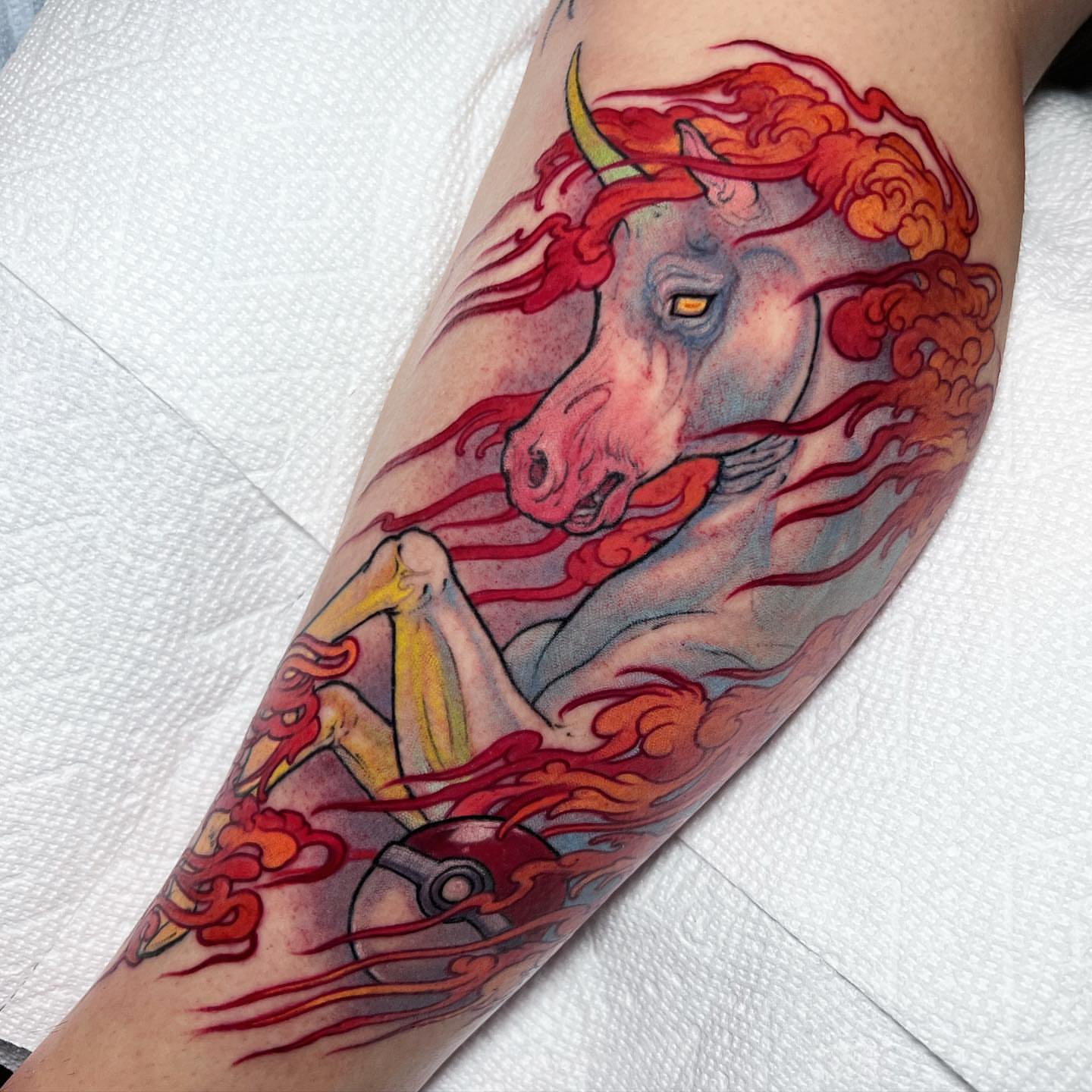 Unicorn illustrative tattoo on the forearm by Alisha Harding