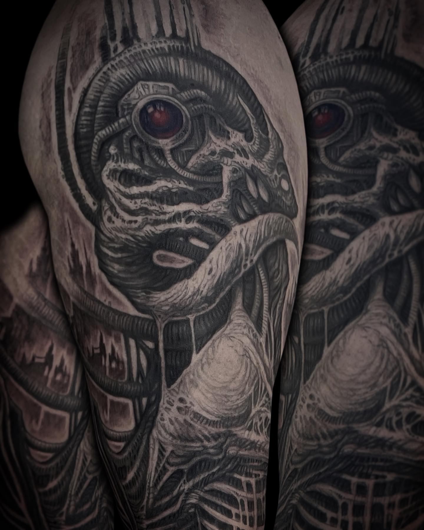 Cyborg face realism tattoo on the upper arm by Brett Herman, Denver, Colorado