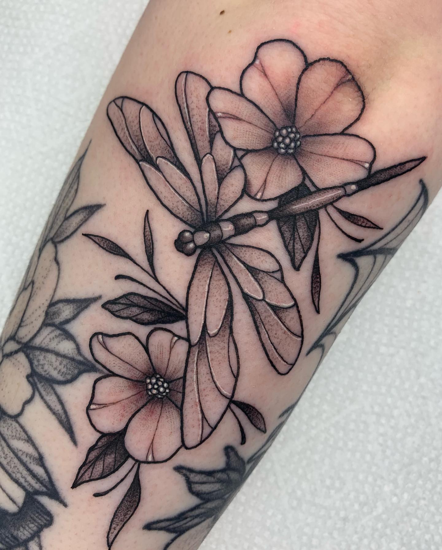 Dogwood flowers dotwork tattoo on the forearm by Luis Torres, Harrison, New Jersey