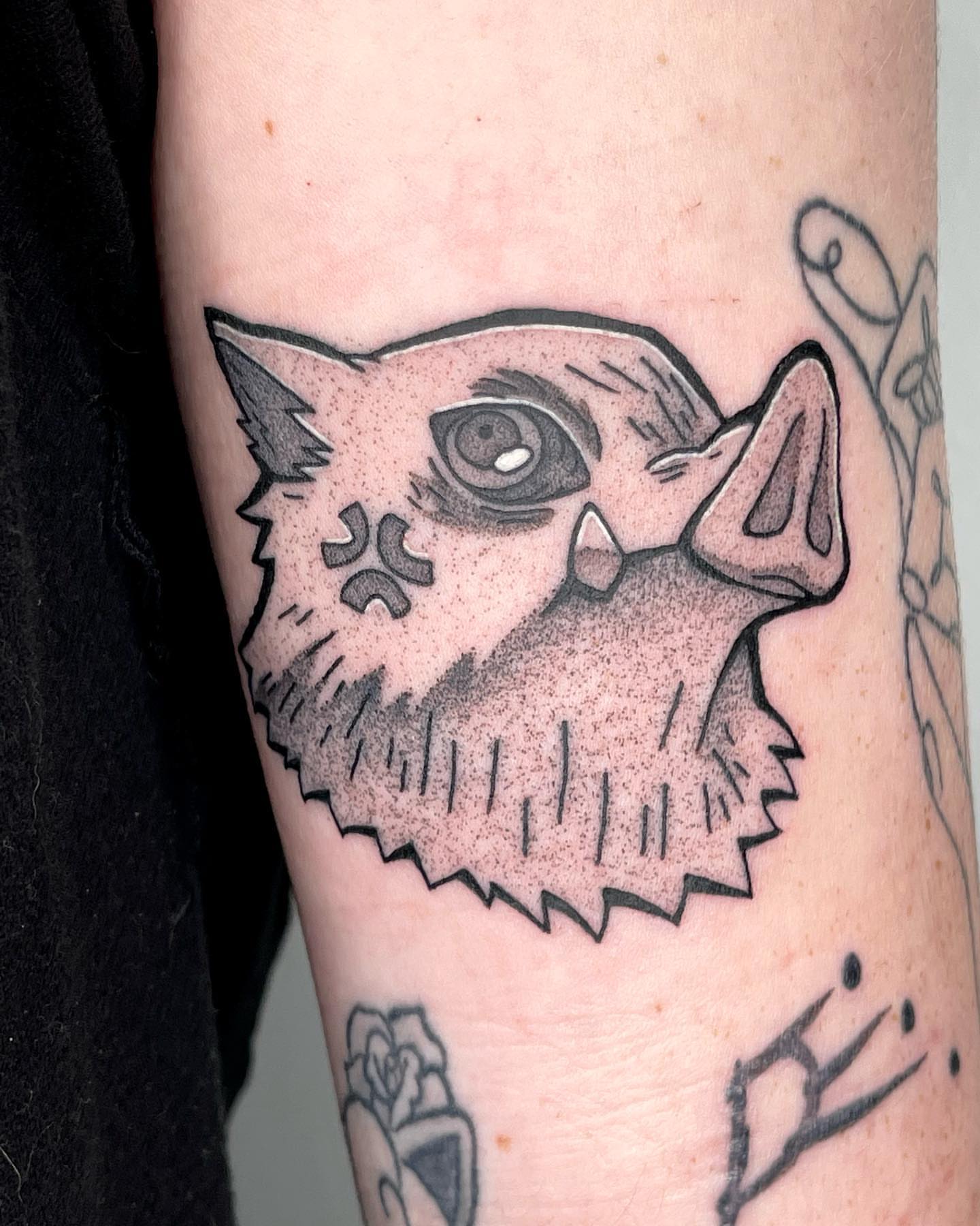 Owl black and grey tattoo on the forearm by Anastasia Vives