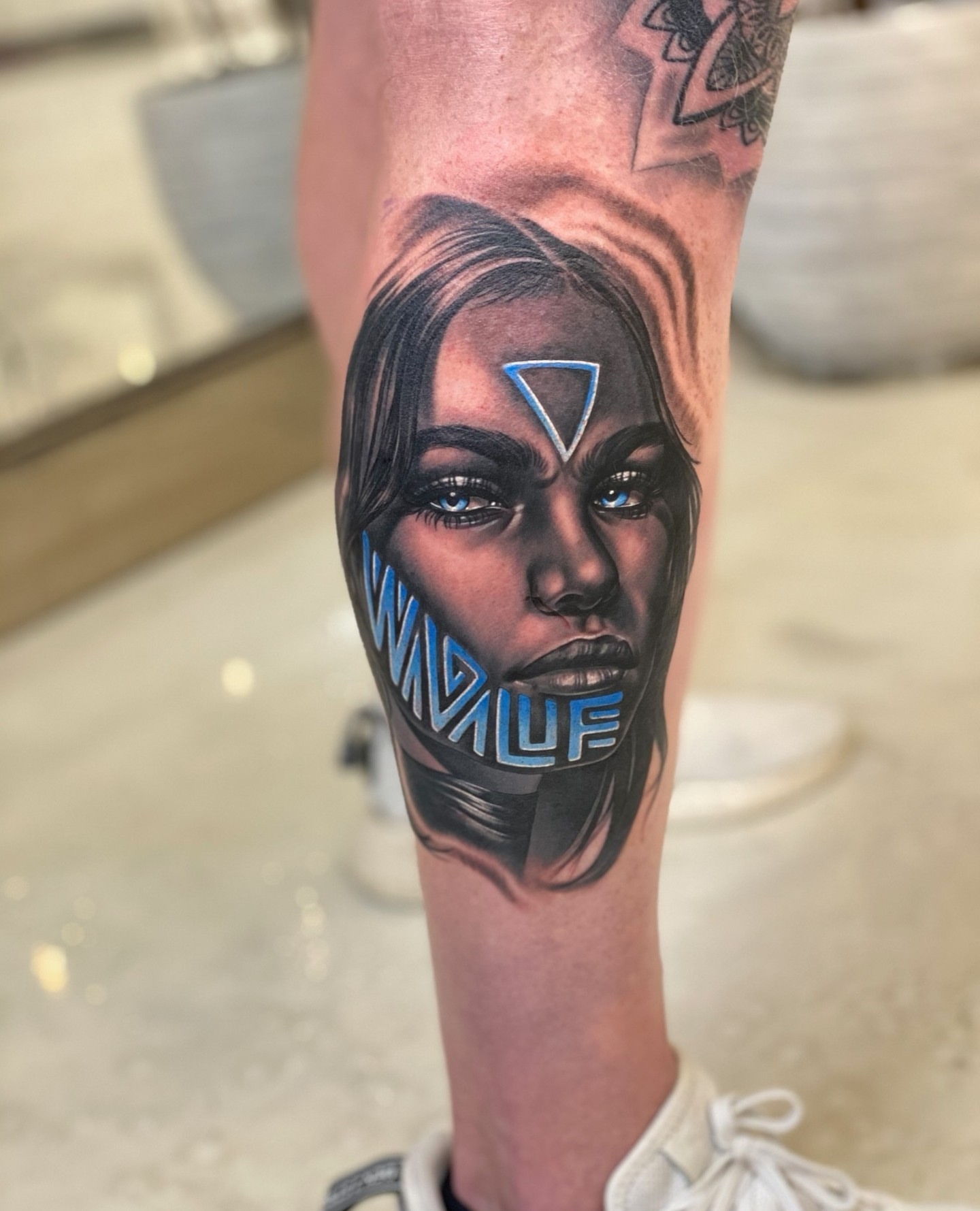 Woman's face realism tattoo on the forearm by Anthony Michaels, Tucson, Arizona
