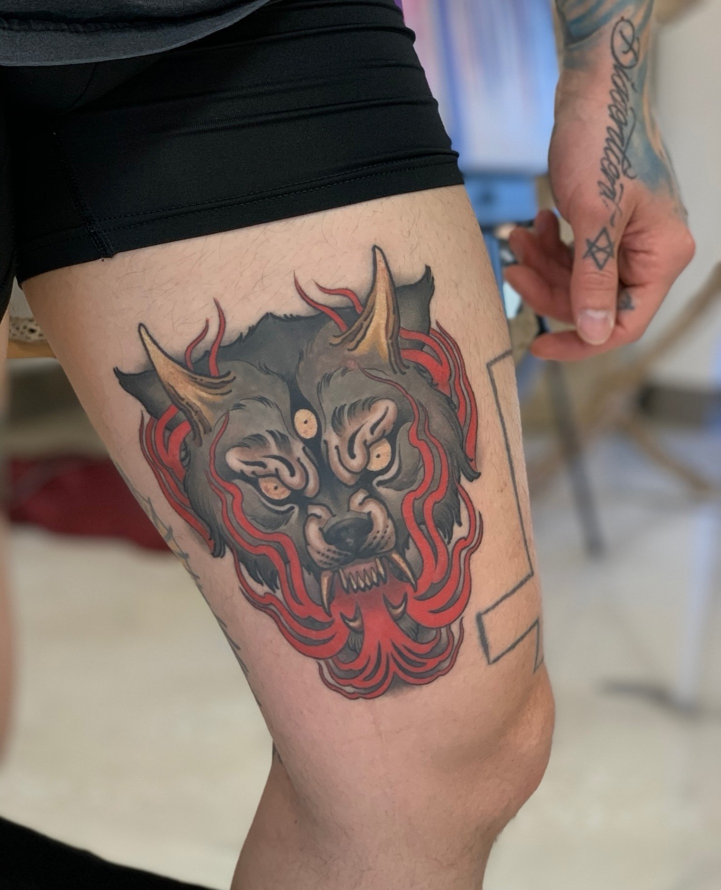 Demon American traditional tattoo on the thigh by Anthony Michaels, Tucson, Arizona