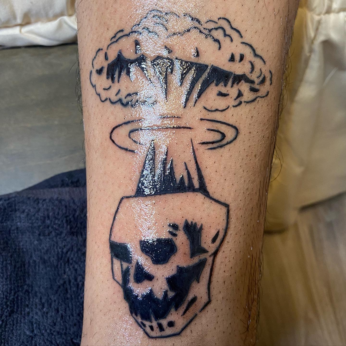 Nuclear explosion black and grey tattoo on the forearm by ππππππ