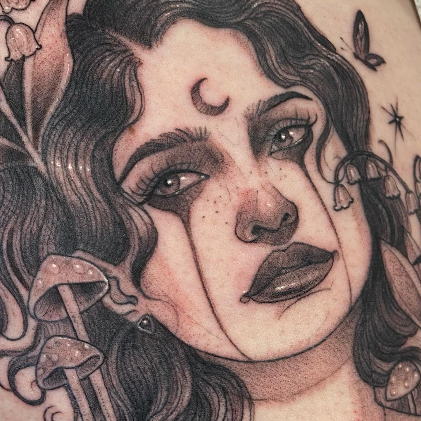 Woman's face realism tattoo on the forearm by Marissa Tattoos