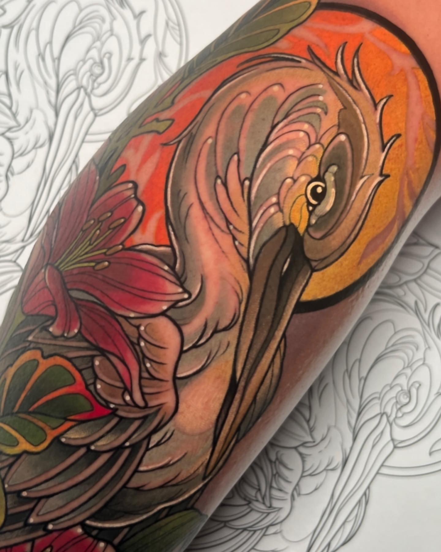 Flamingo and lily American traditional tattoo on the forearm by James Boag