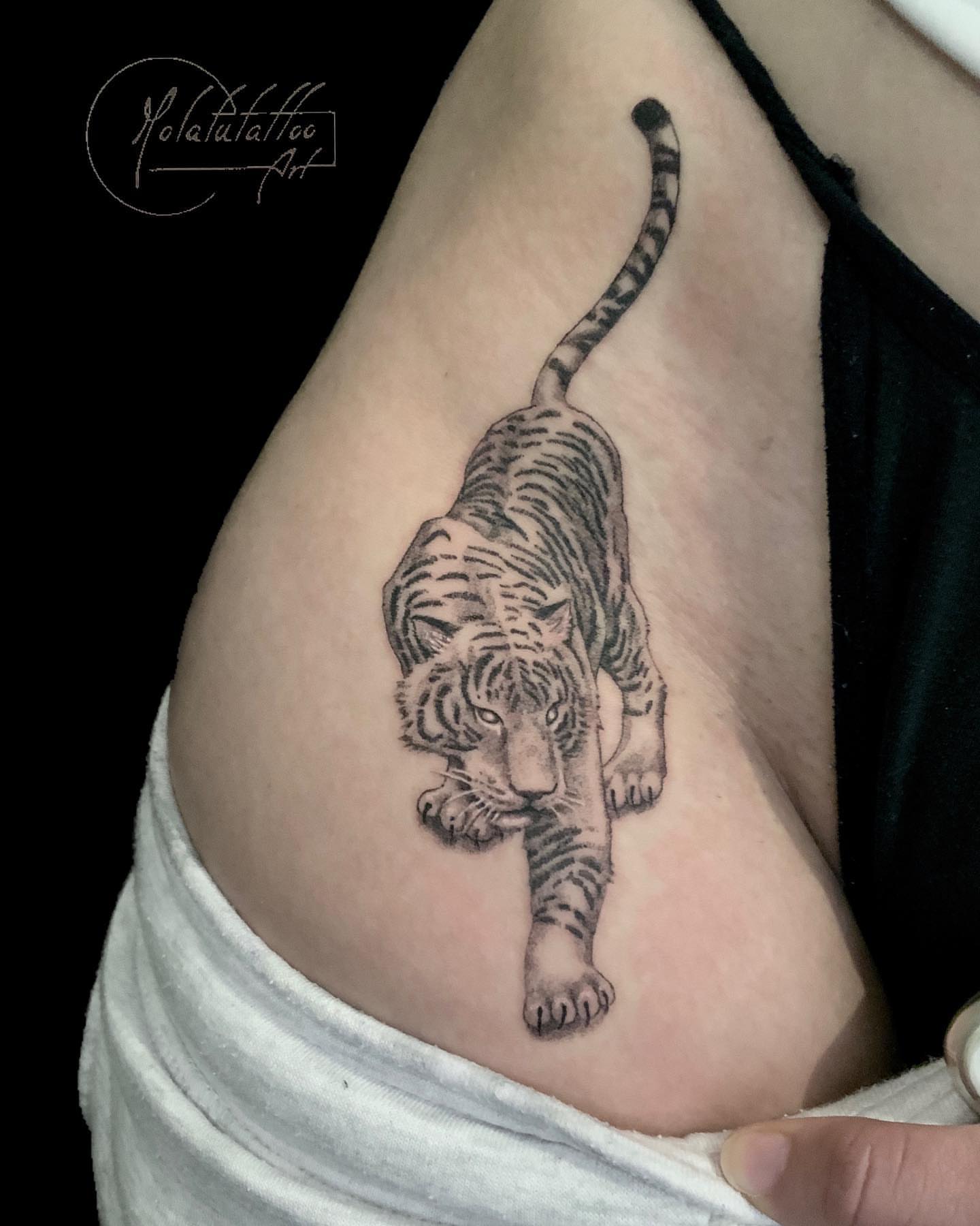 Tiger realism tattoo on the thigh by Molatutattoo