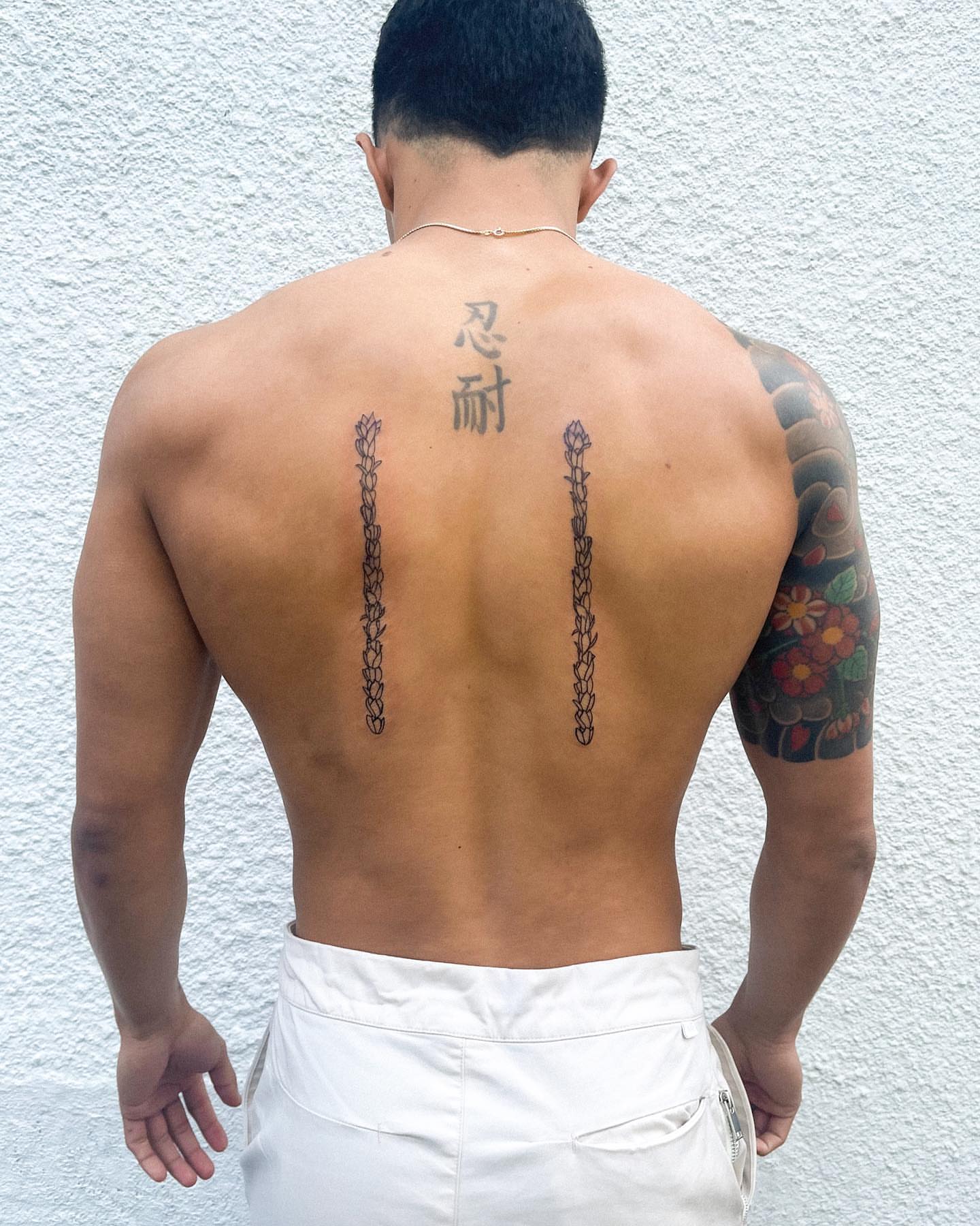 Kanji characters black and grey tattoo on the back by Portland Tattoo Artist