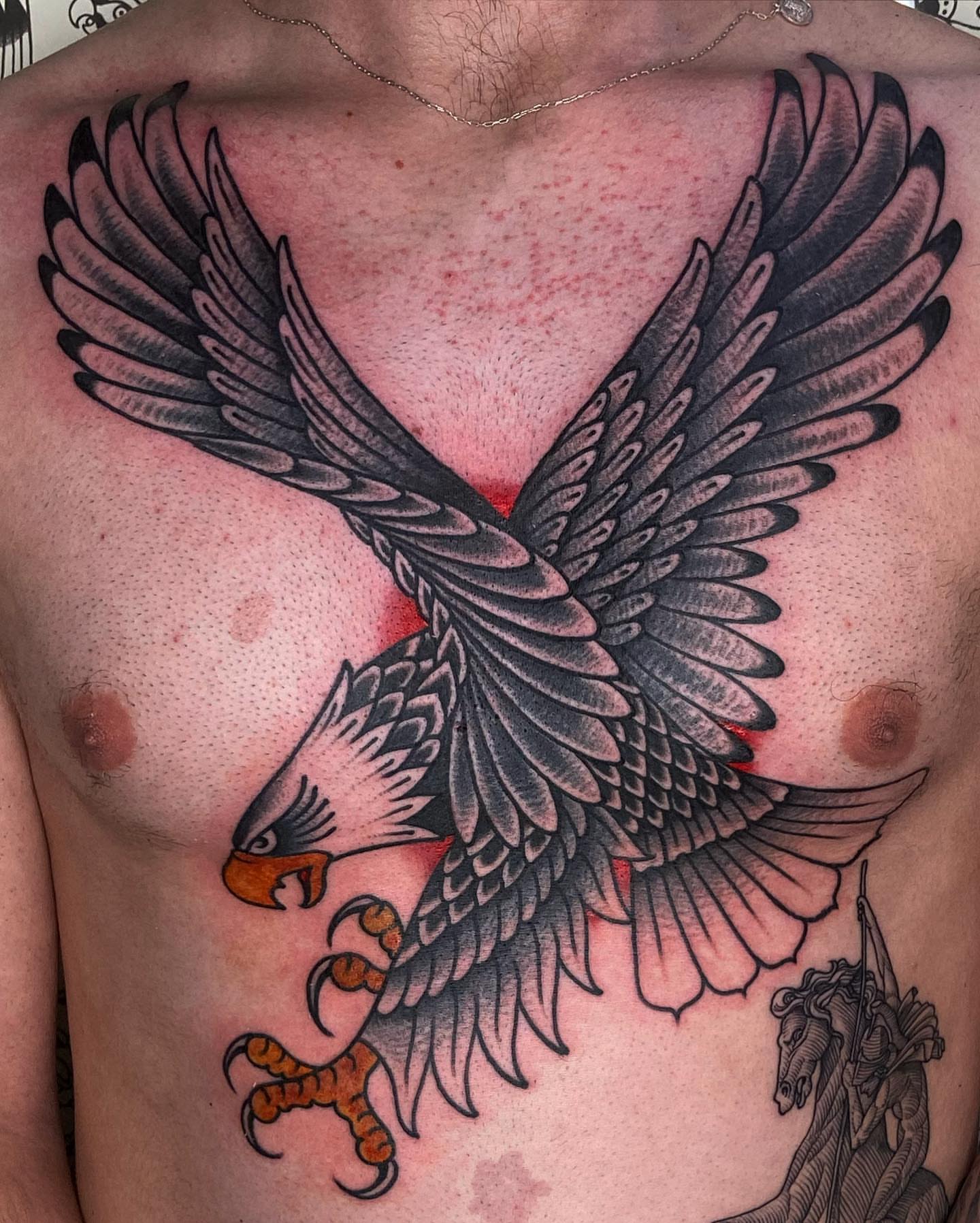 Eagle American traditional tattoo on the chest by Rob Banks