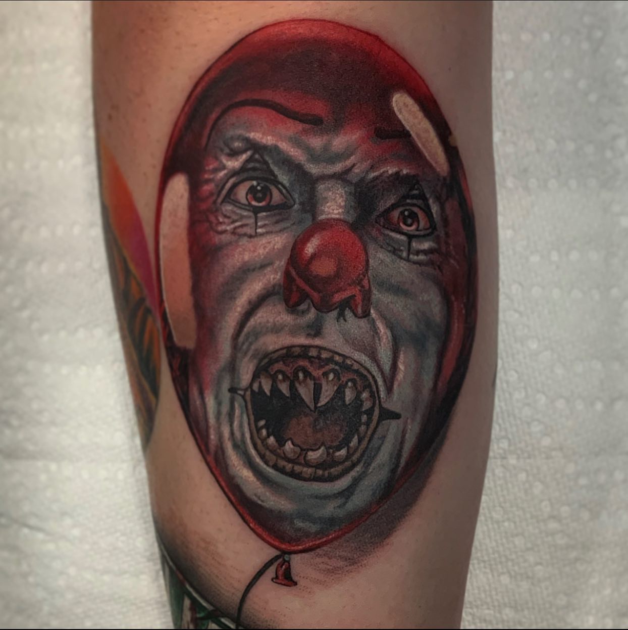 Clown realism tattoo on the forearm by Izak Blanke, Murfreesboro, Tennessee