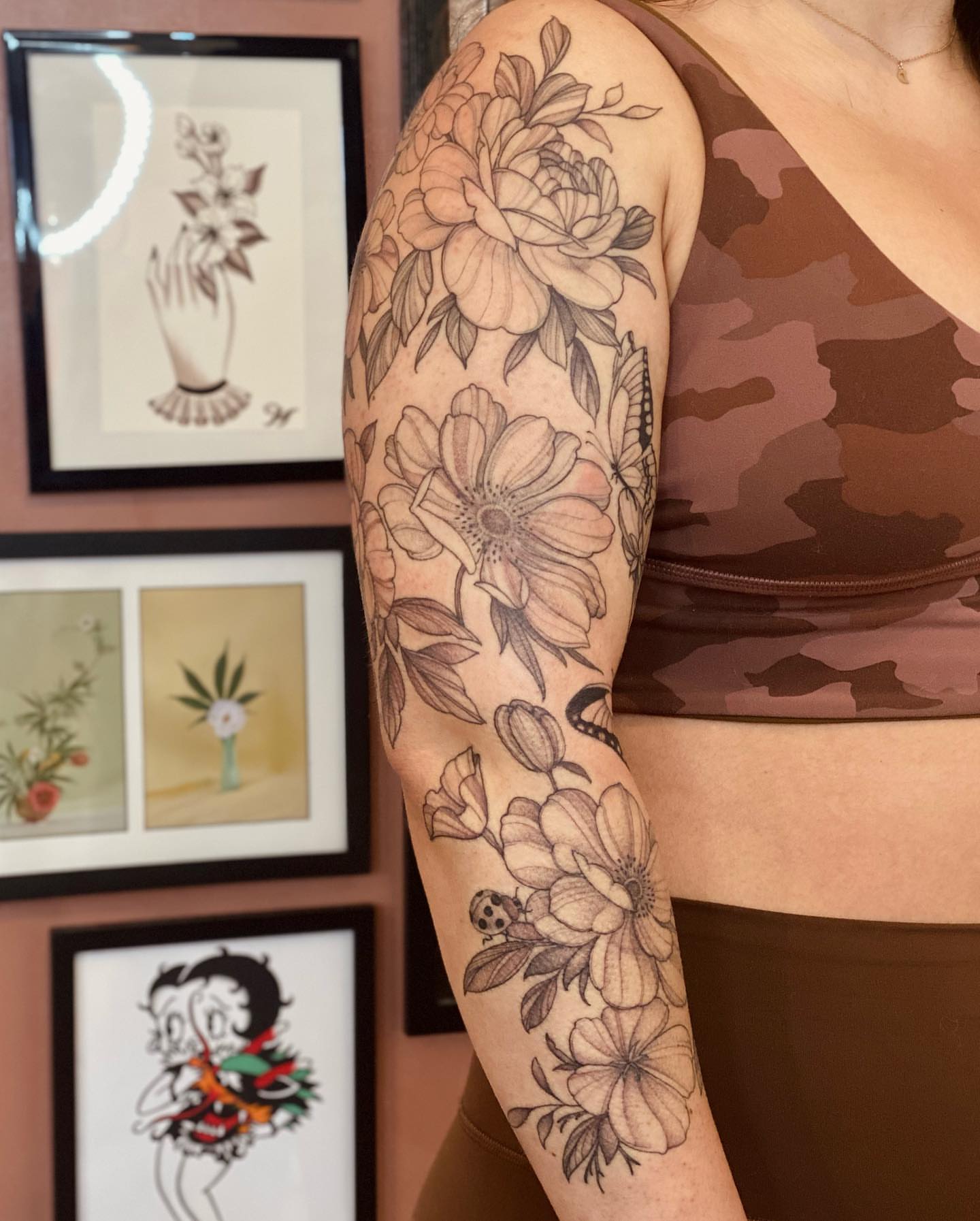 Floral bouquet black and grey tattoo on the forearm by 𝘉𝘢𝘺 𝘈𝘳𝘦𝘢 𝘛𝘢𝘵𝘵𝘰𝘰 𝘈𝘳𝘵𝘪𝘴𝘵, Oakland, California