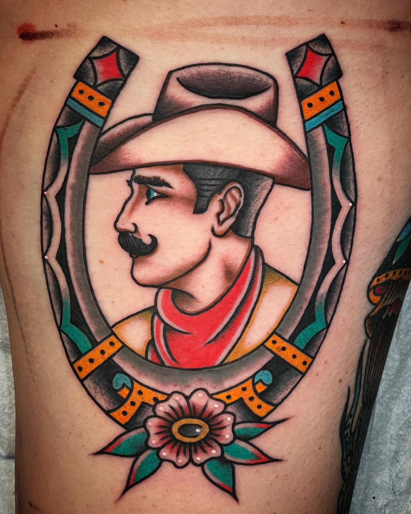 Cowboy portrait American traditional tattoo on the thigh by Alex Muniz