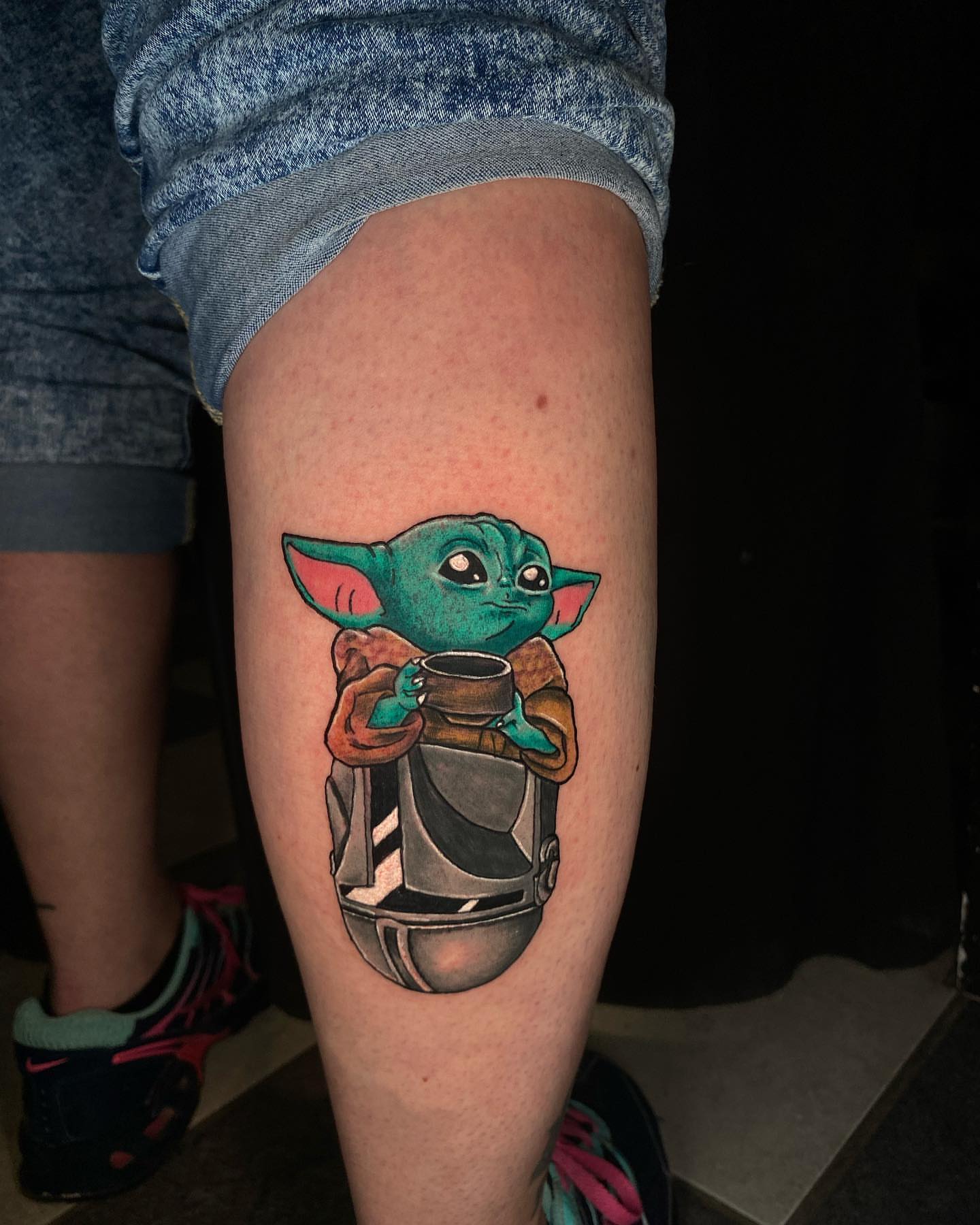 Baby Yoda realism tattoo on the thigh by Glen Wallis