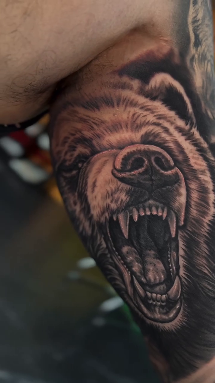 Tattoo by @tattoos_by_junior — realism, black_and_grey