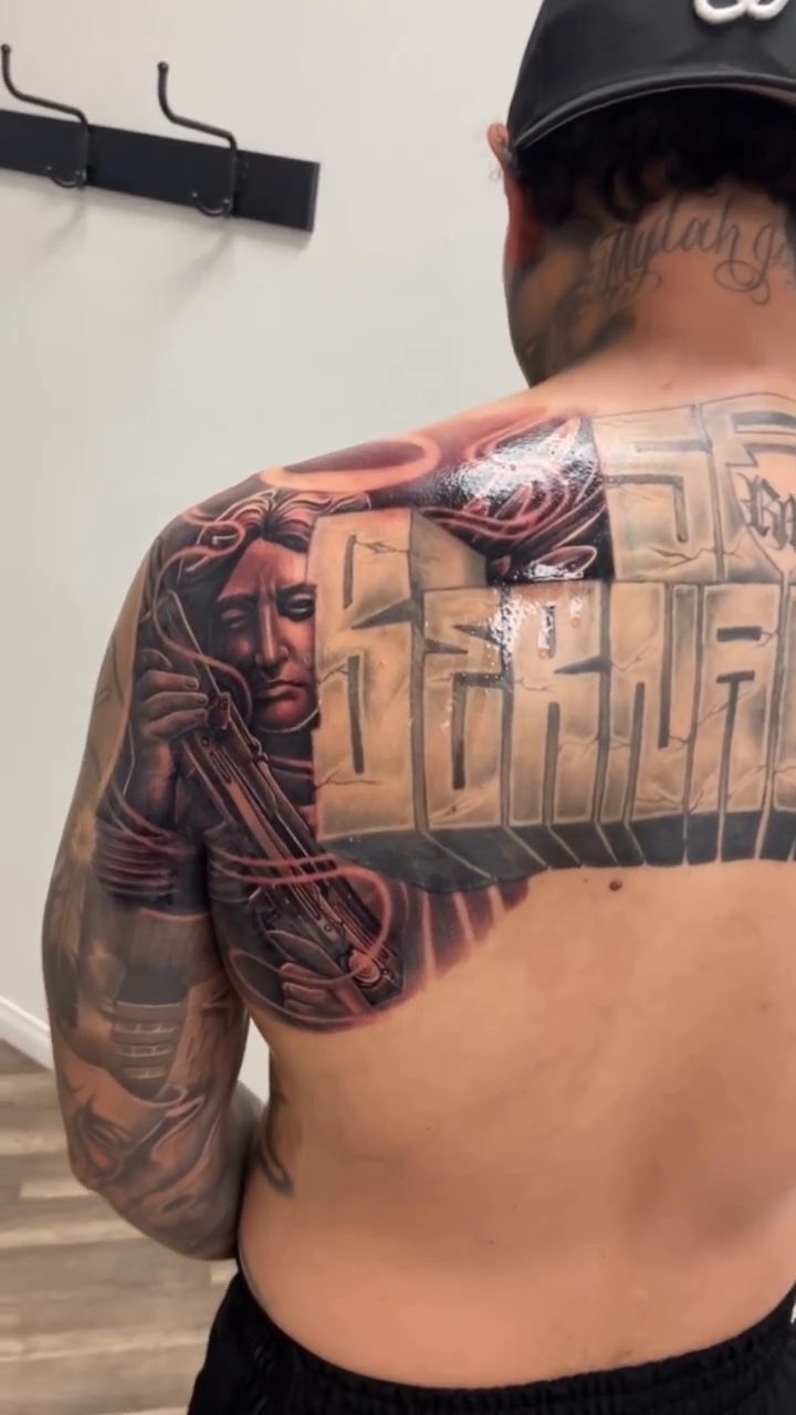 Portrait with lettering realism tattoo by Joshua ramirez, Montebello, California